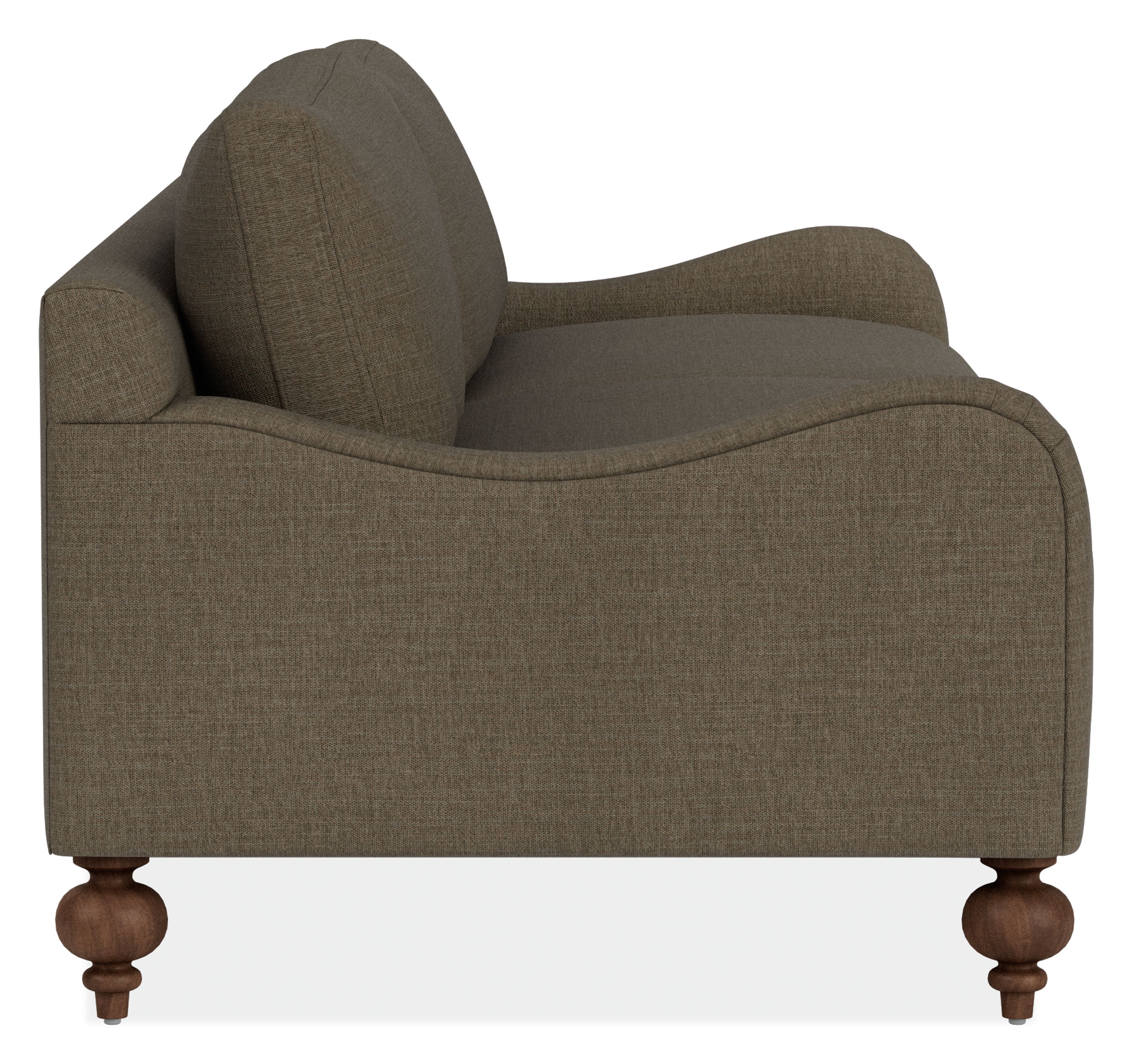 Side view of Eloise 87 Sofa in Mori Olive Fabric with Mocha-stained with turned leg.