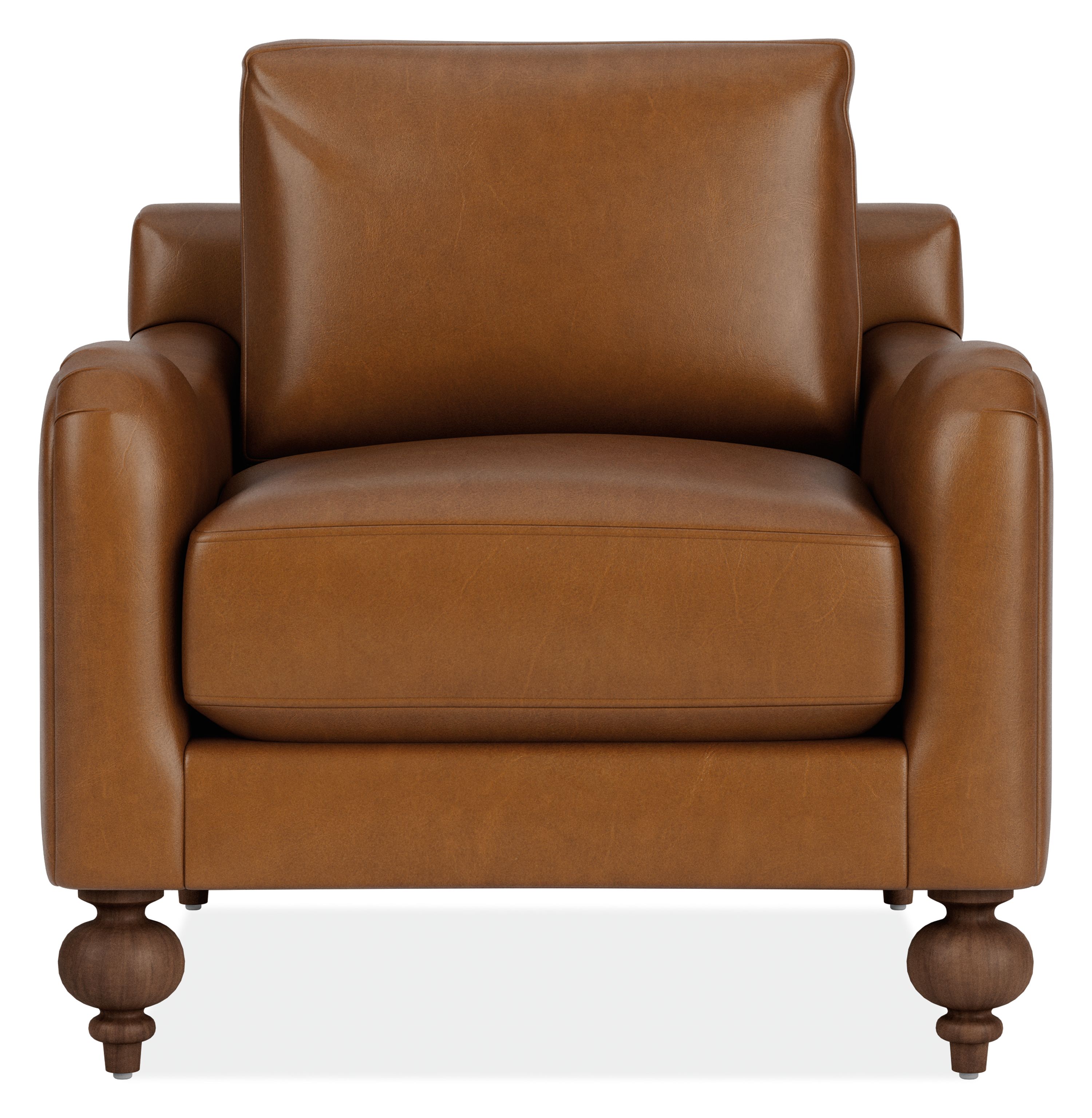 Front view of Eloise Chair in Vento Cognac Leather with Mocha-stained  turned legs.
