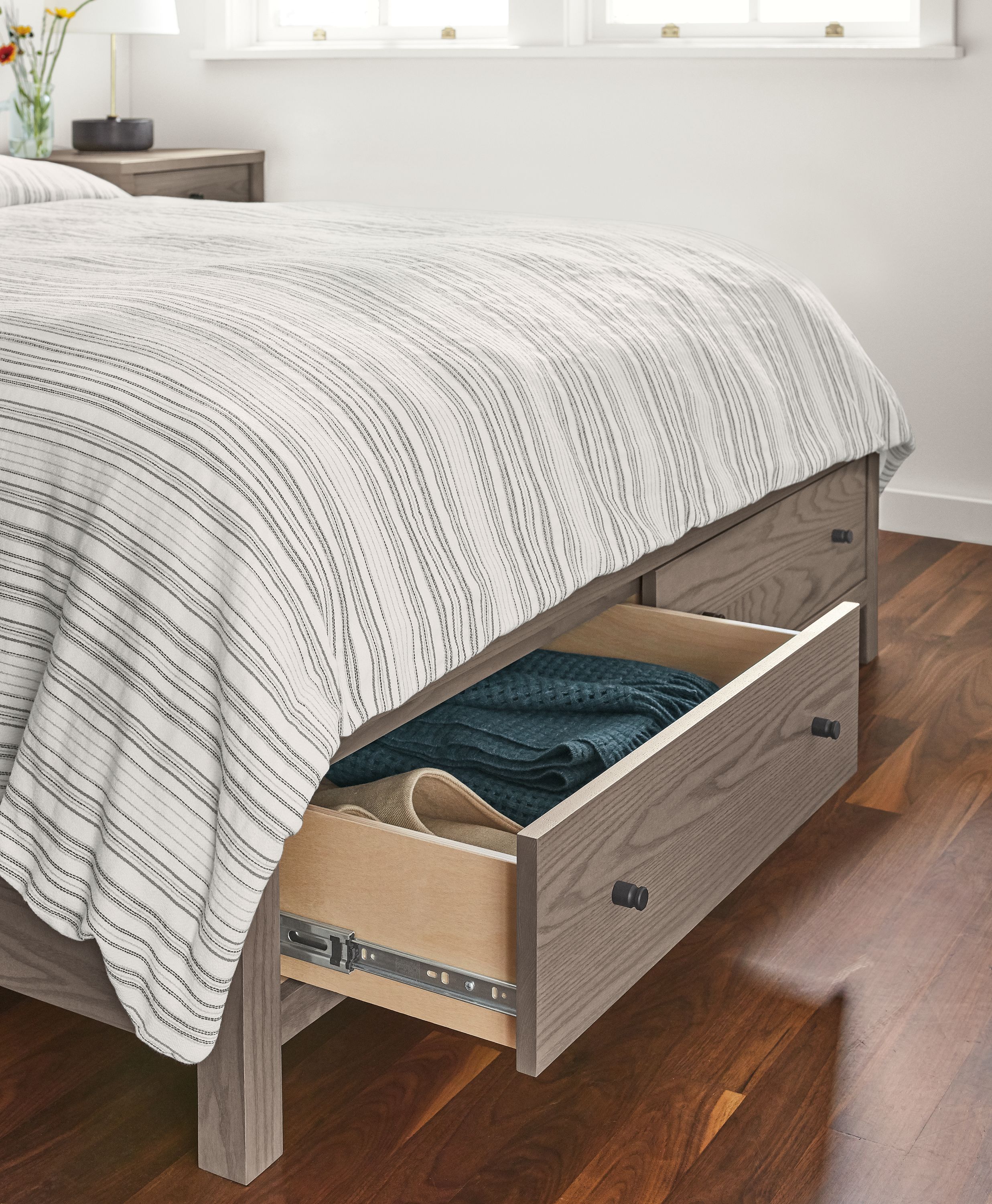 Detail of open Emerson storage bed drawer.