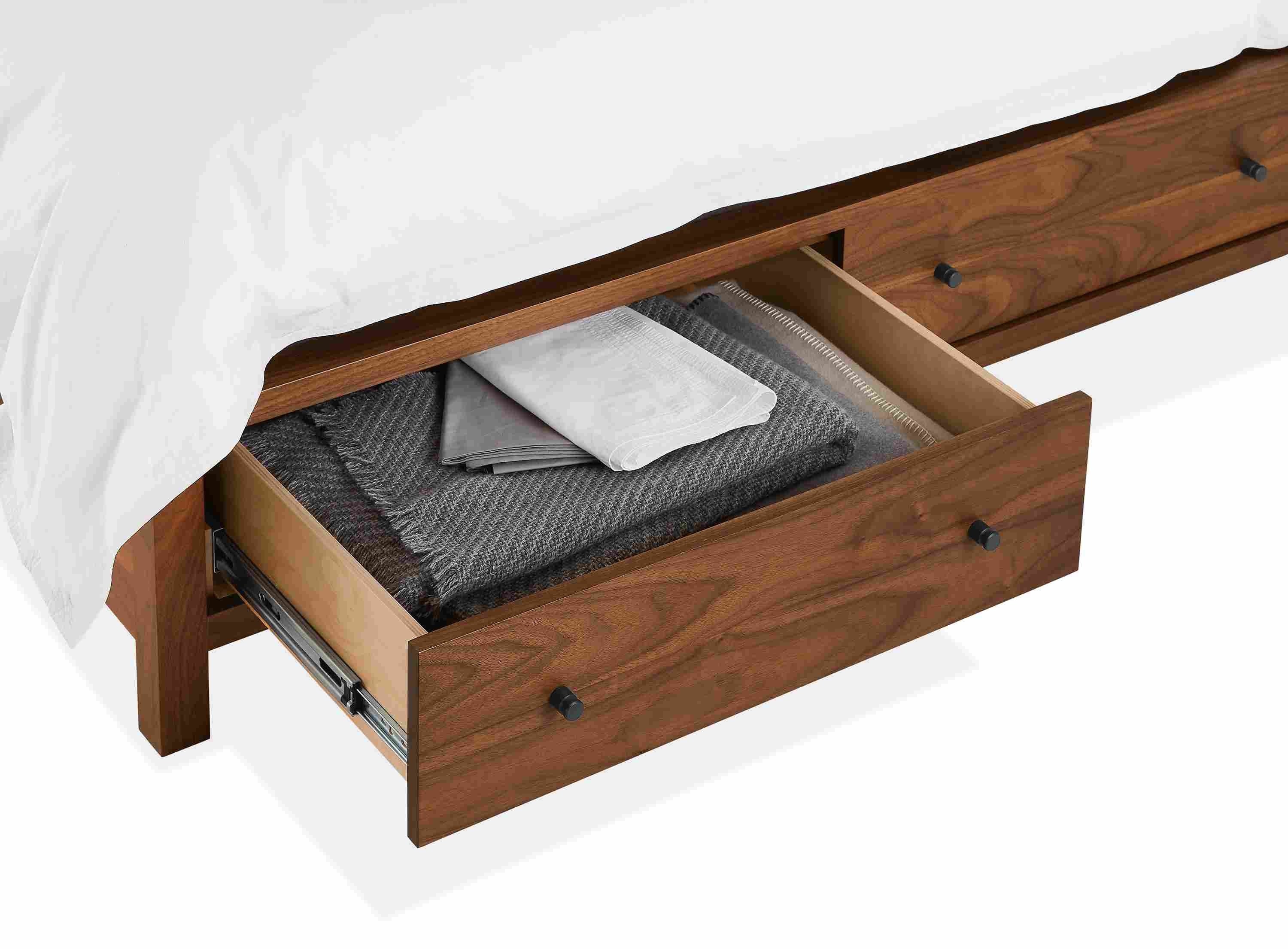 Detail silhouette of open Emerson bed drawer.