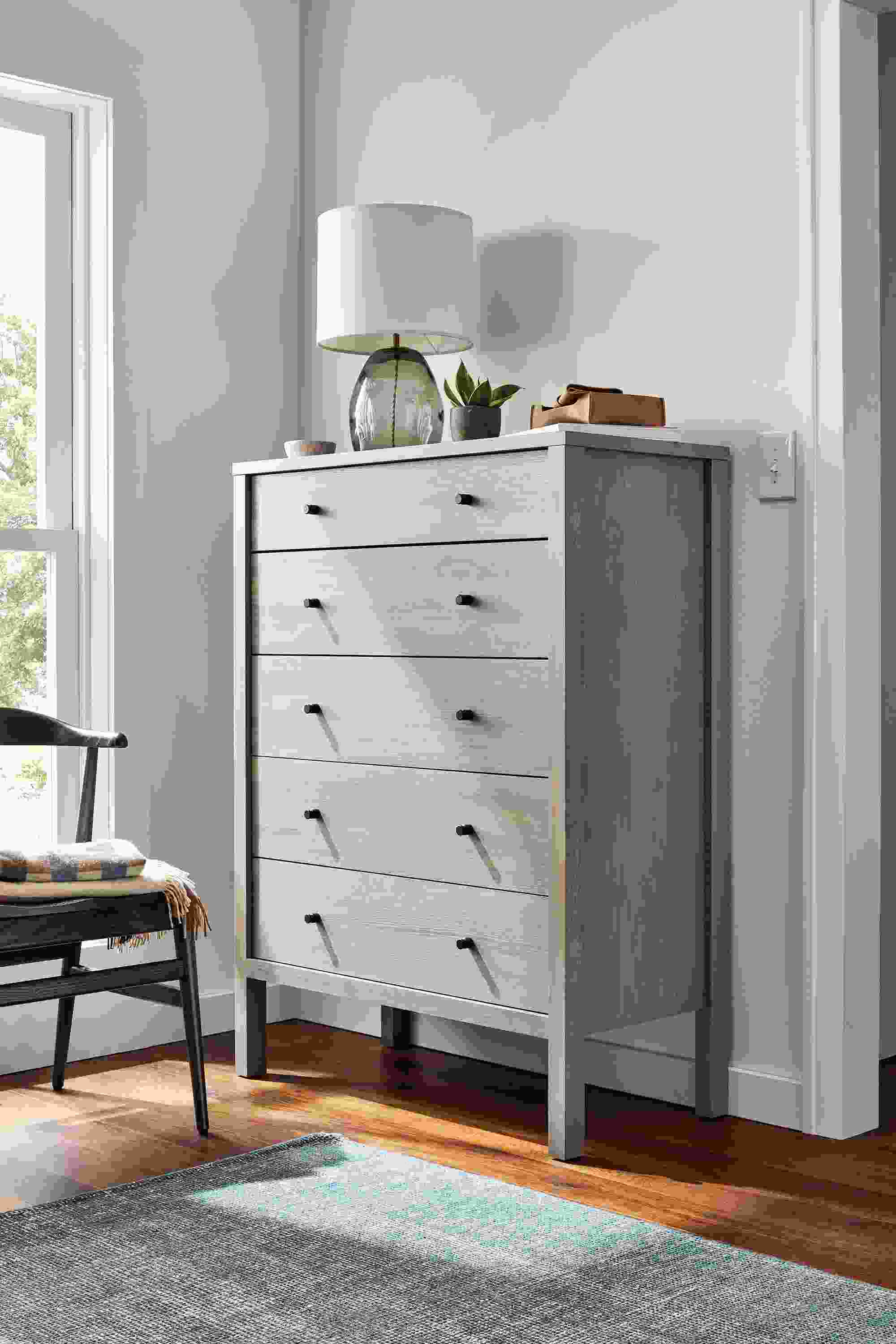 detail of emerson five-drawer dresser in shell in bedroom.
