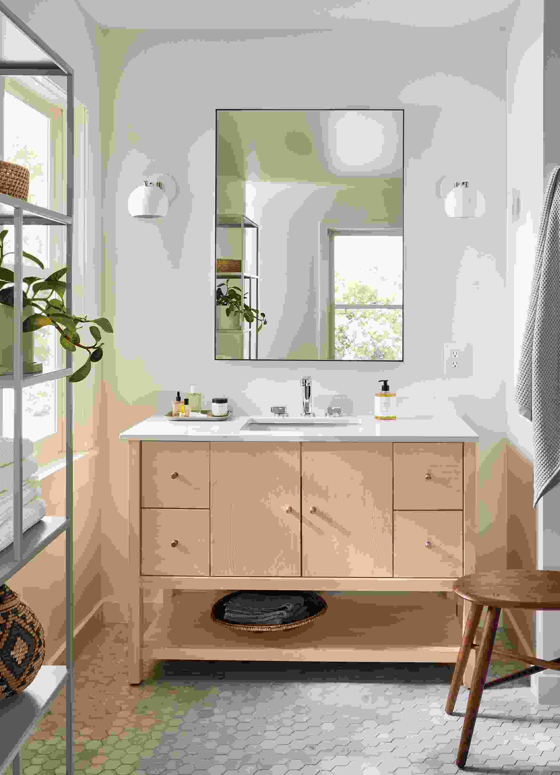 Bathroom with emerson 48-wide single-sink vanity in salt on red oak and Foshay bookcase in taupe.