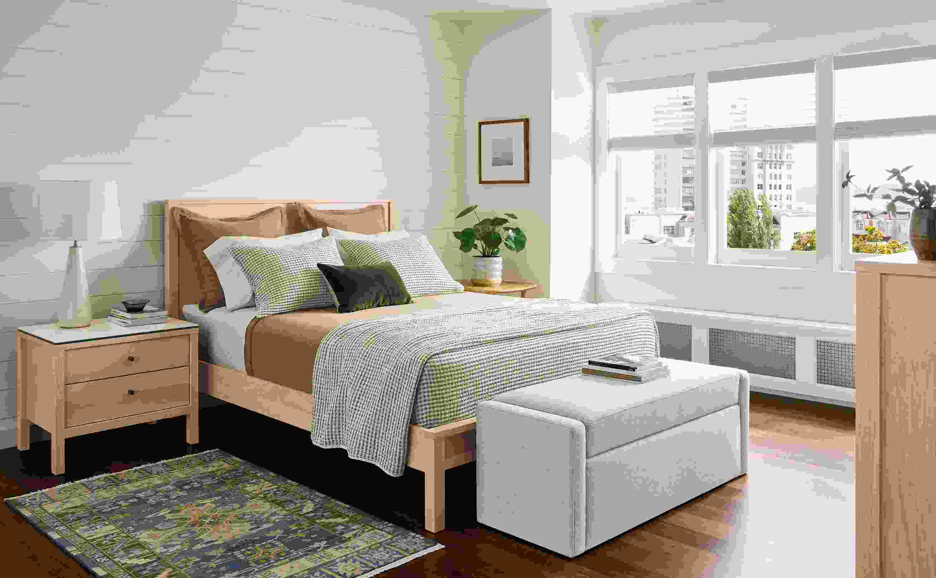 Bedroom with Emerson queen bed, dresser and nightstand in salt on red oak.