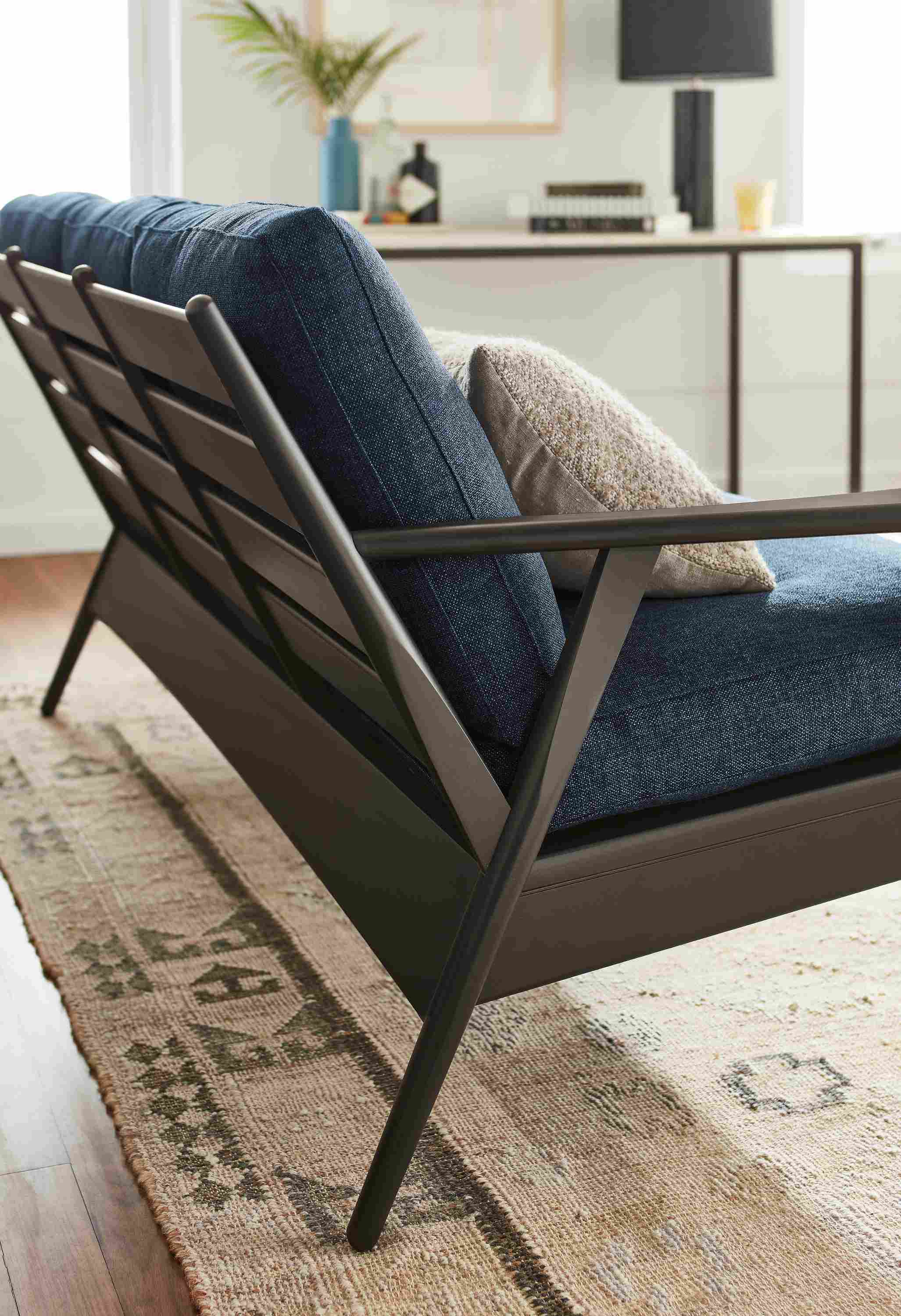 detail of back of ericson sofa in charcoal.