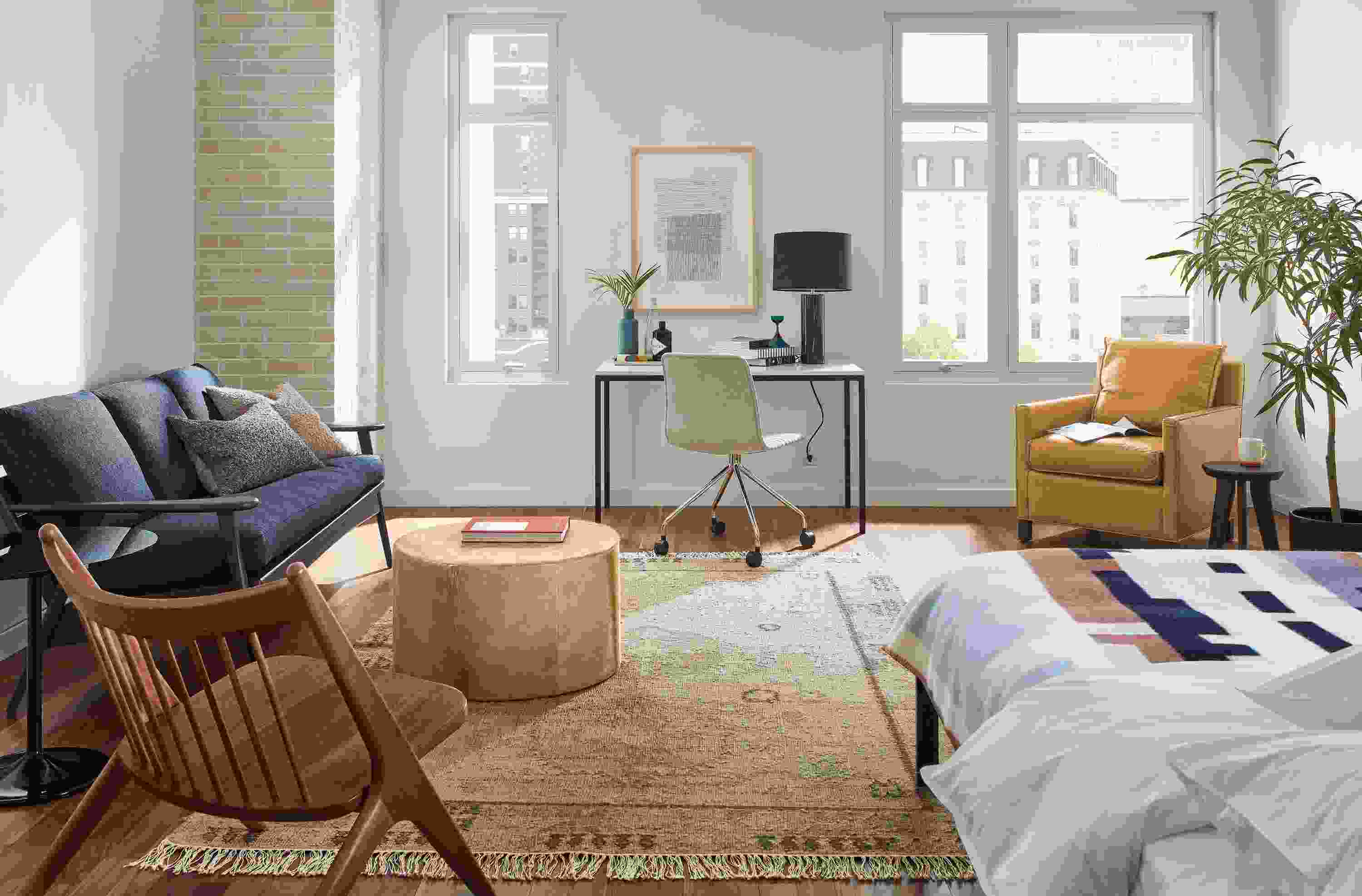 studio apartment with ericson sofa, parsons desk, core bed.