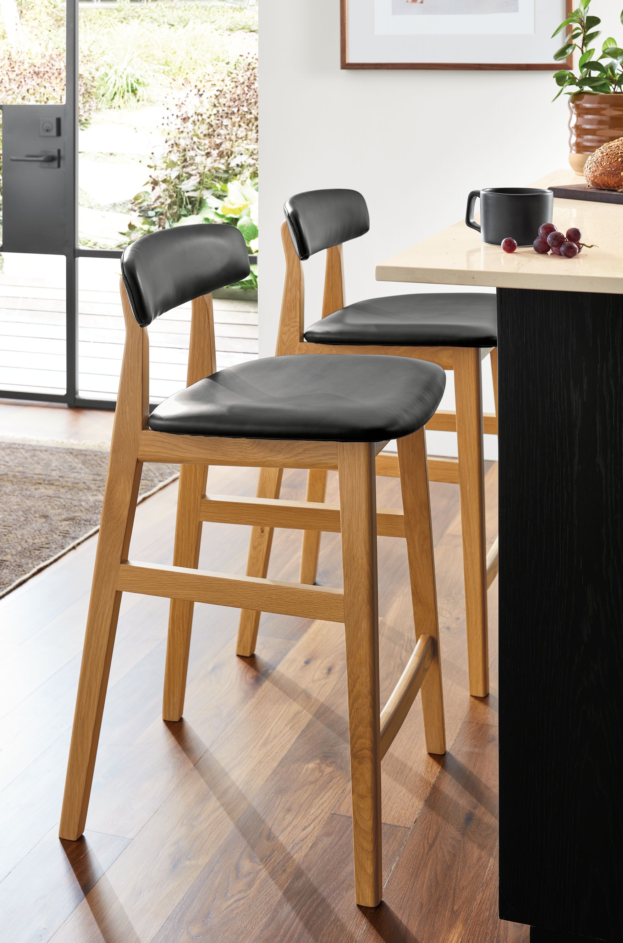 Counter stool in white oak with Buri black leather