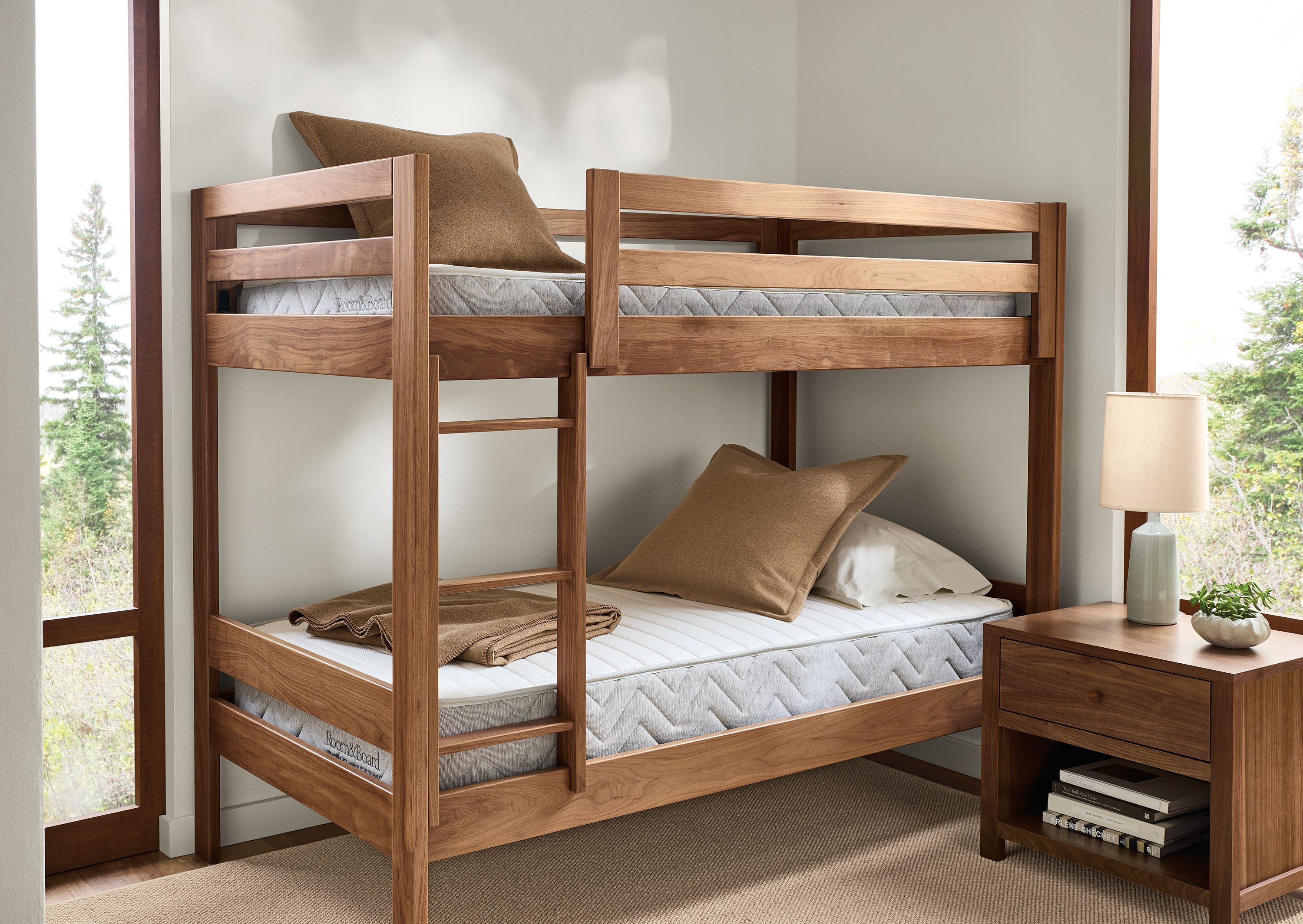 Bedroom with TW Essential Foam & Coil bunk and mattress on a Waverly twin bunk bed in walnut.