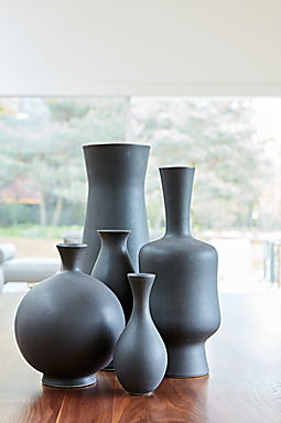 Close detail of five Eva Zeisel vases.