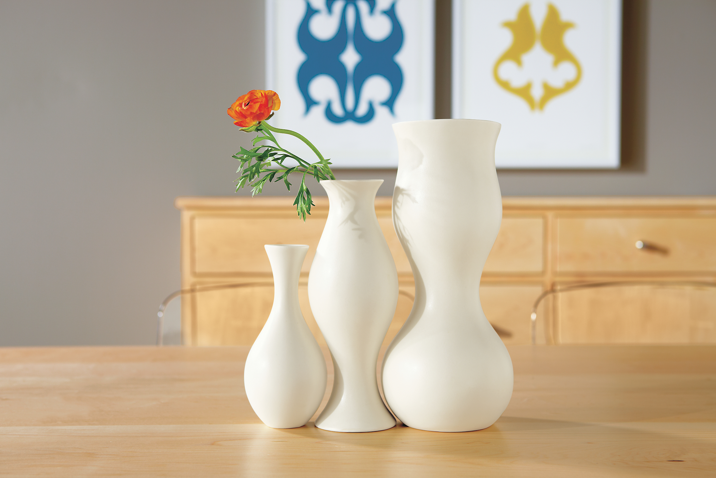 Dining room with Eva Zeisel vase in ivory.