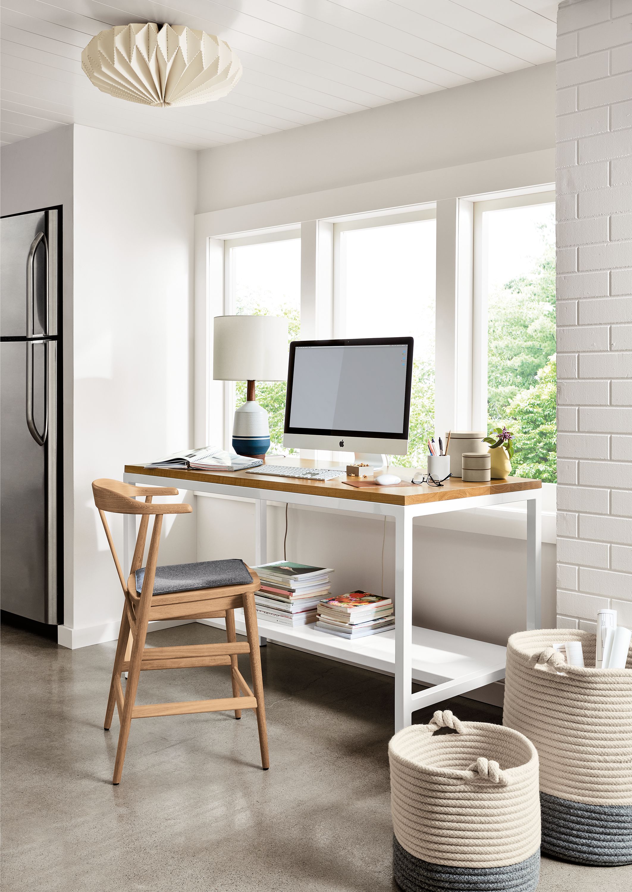 Home desk with Evan counter chair in rye on red oak and Parsons desk in white.