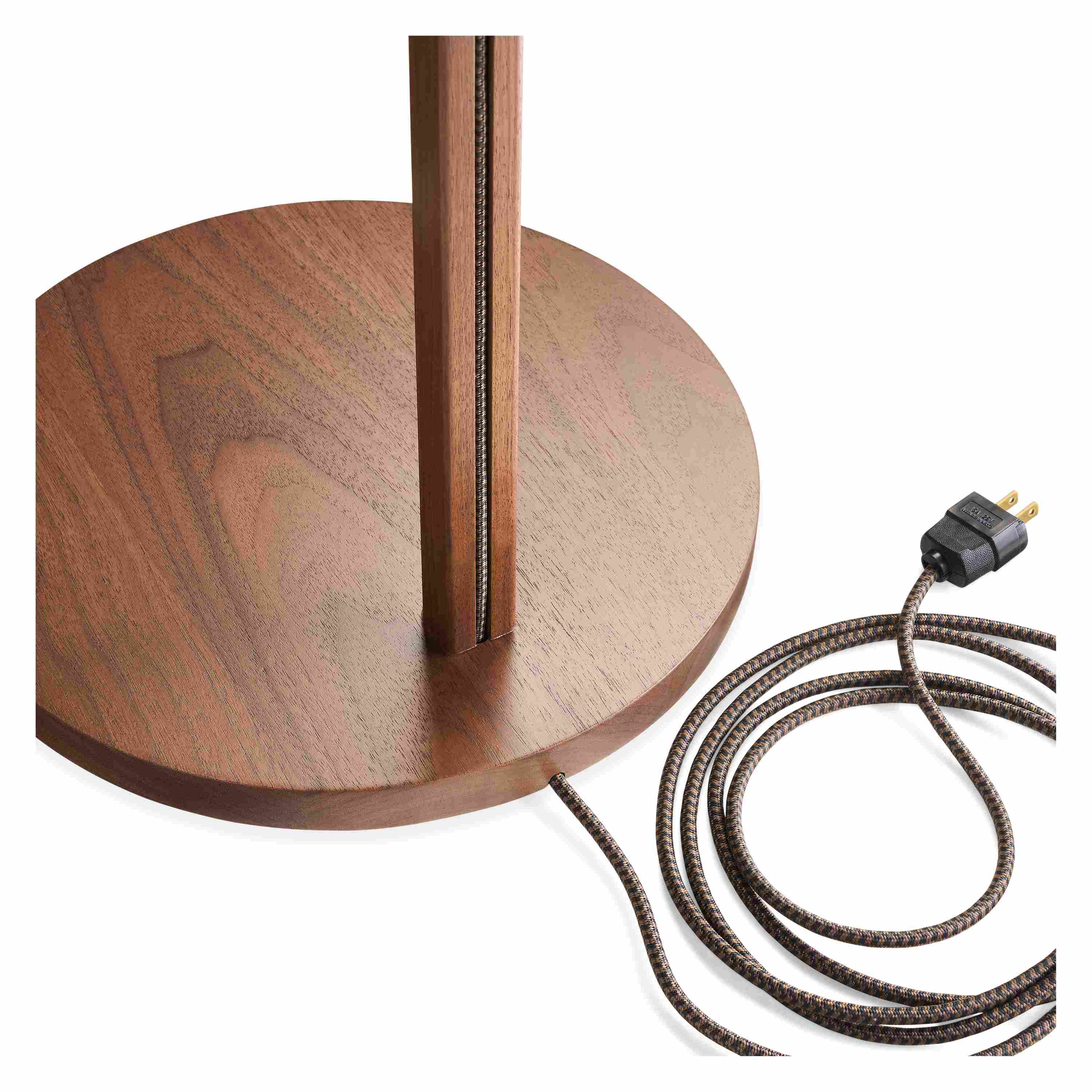 Detail of base and cord on Everett 61-inch floor lamp in walnut.