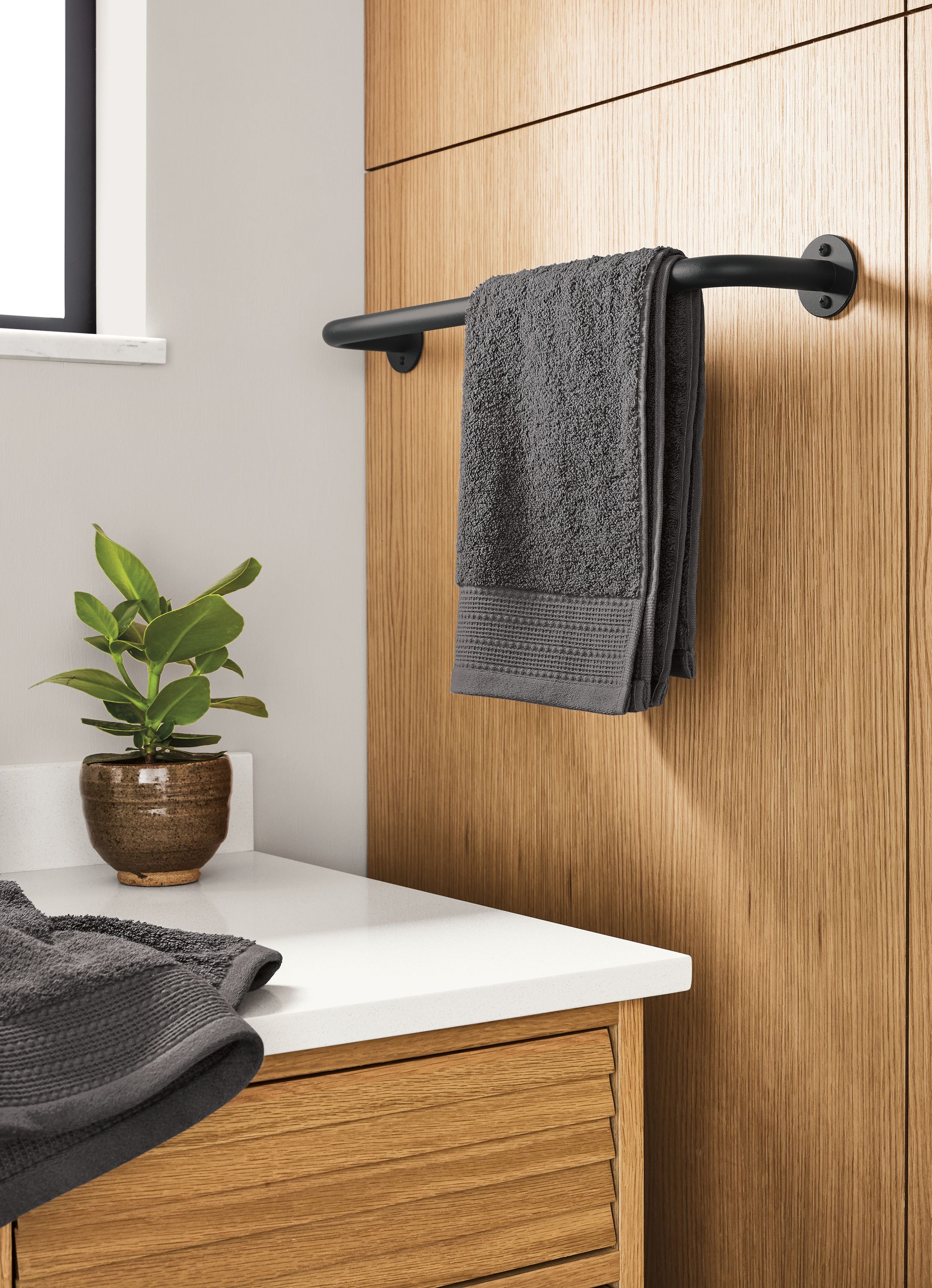 Detail of Filmore 18w towel rack in graphite.