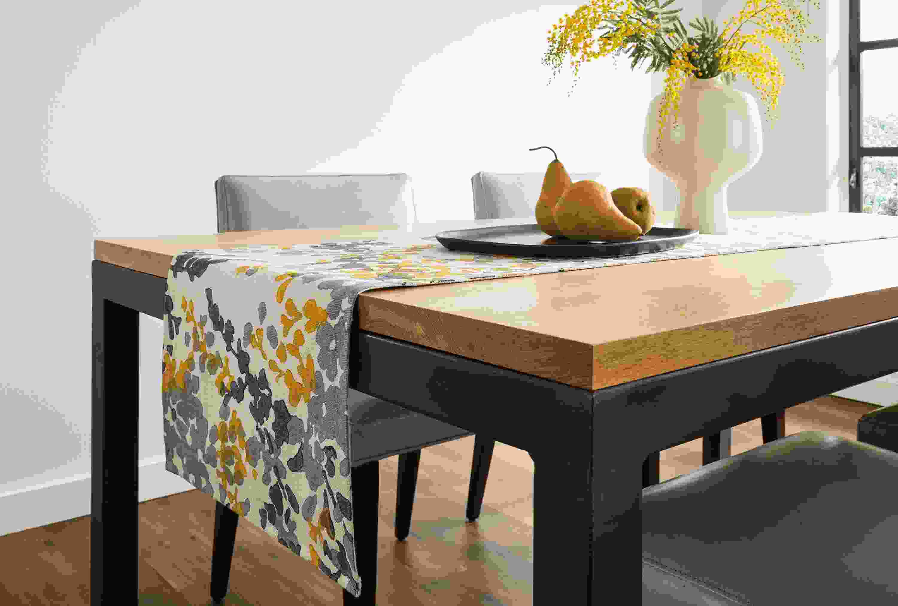Dining room with Fleur table runner in saffron.