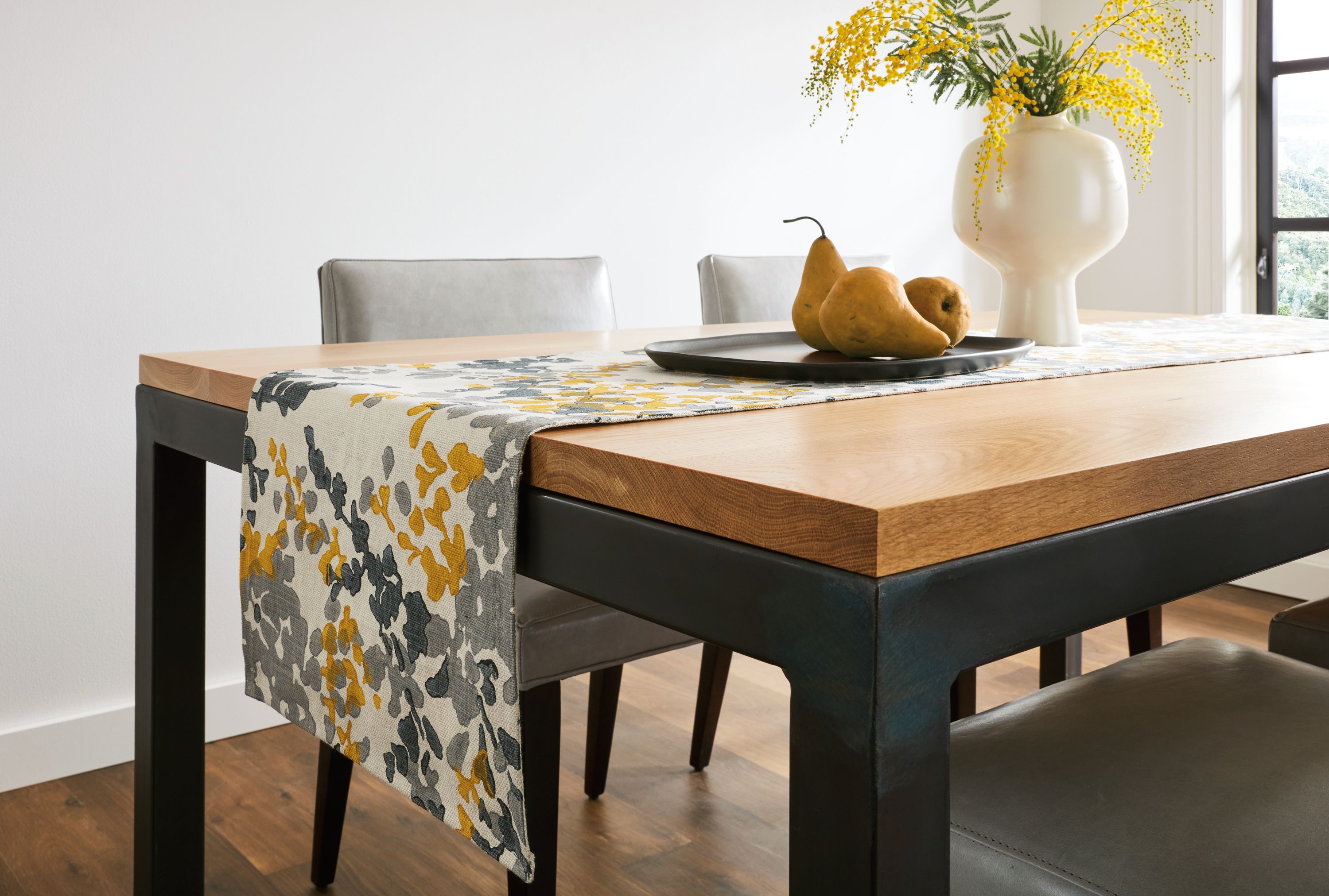 Dining room with Fleur table runner in saffron.