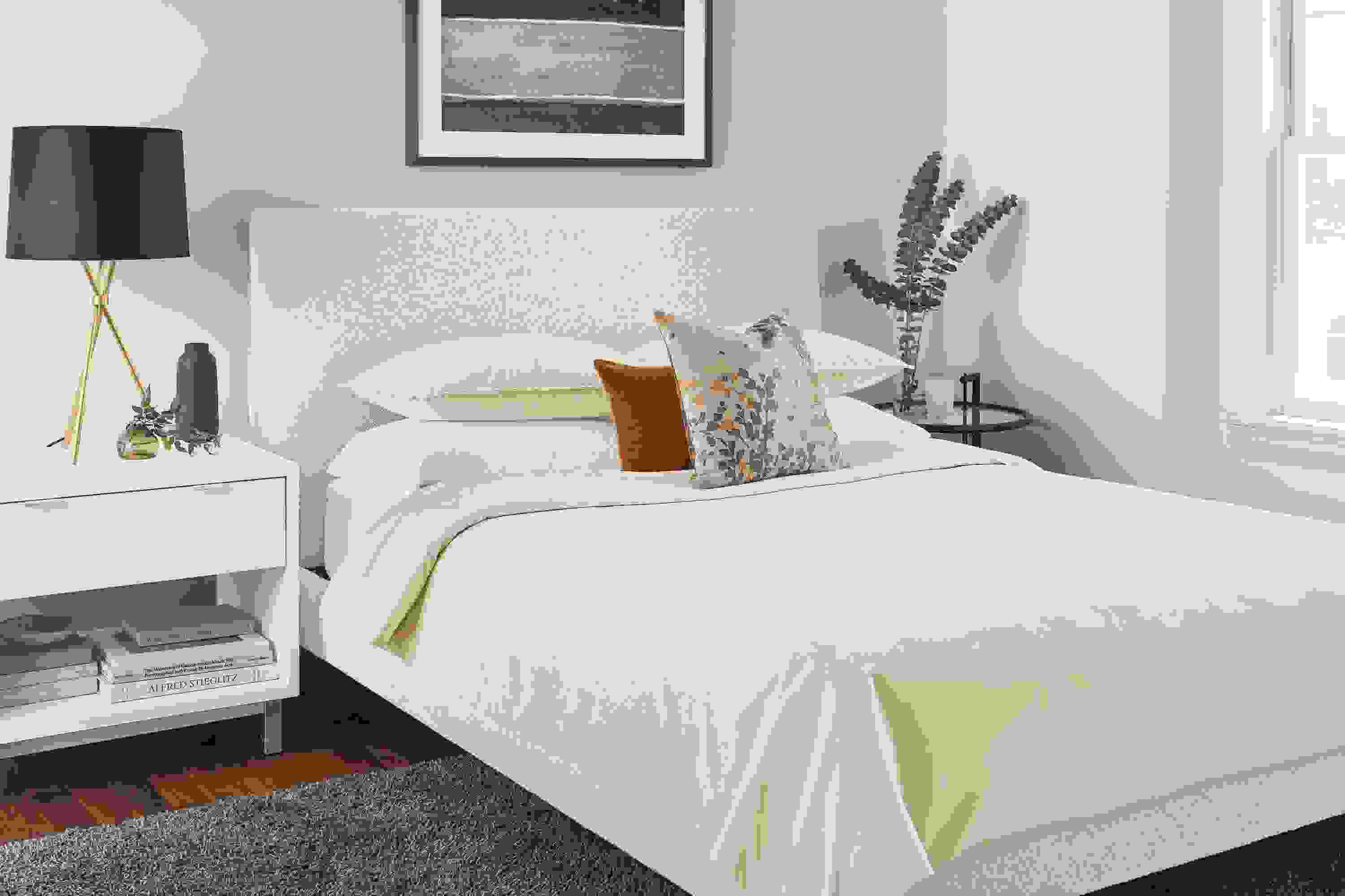 Detail of Fontaine duvet cover in ivory in bedroom.
