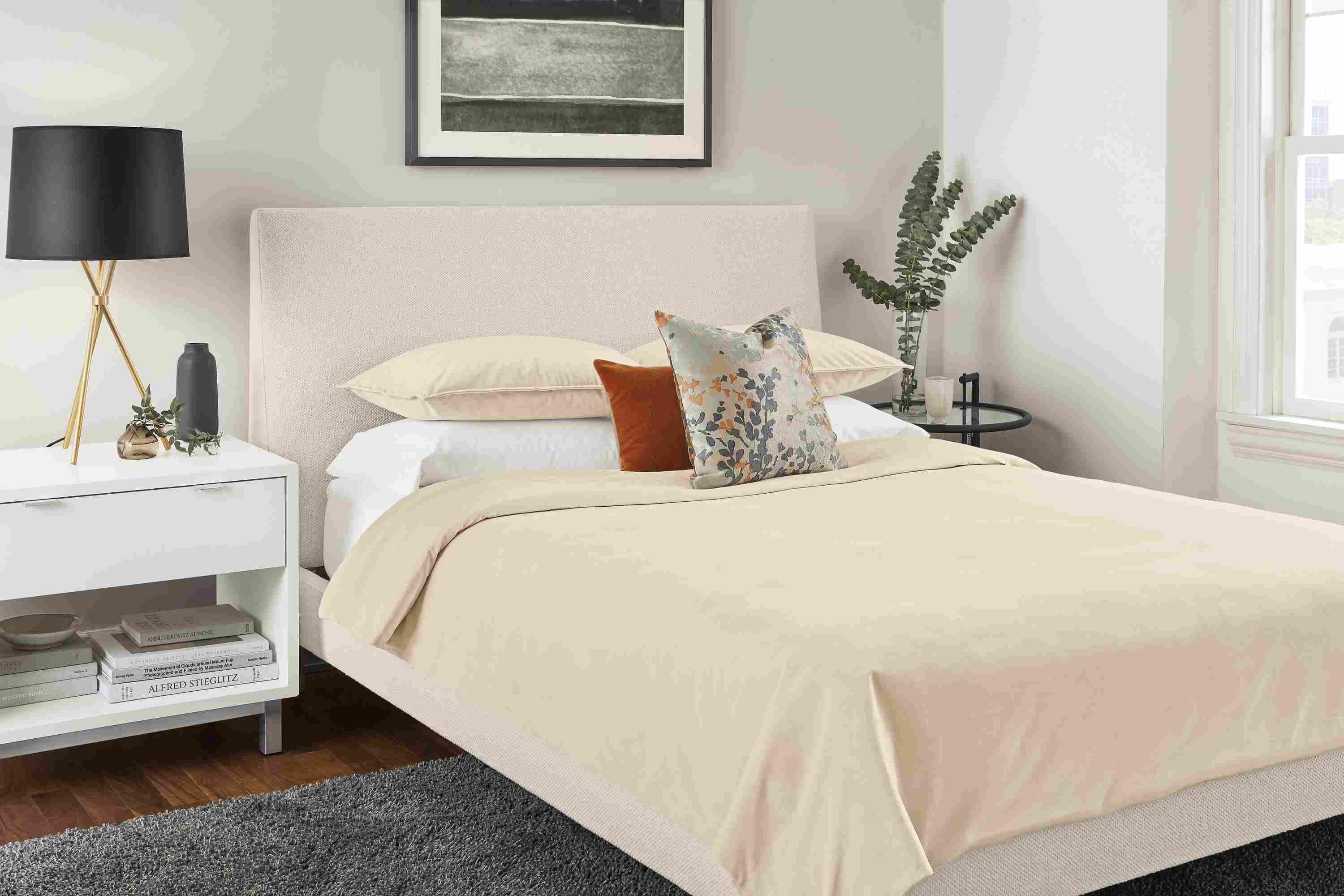Detail of Fontaine duvet cover in ivory in bedroom.