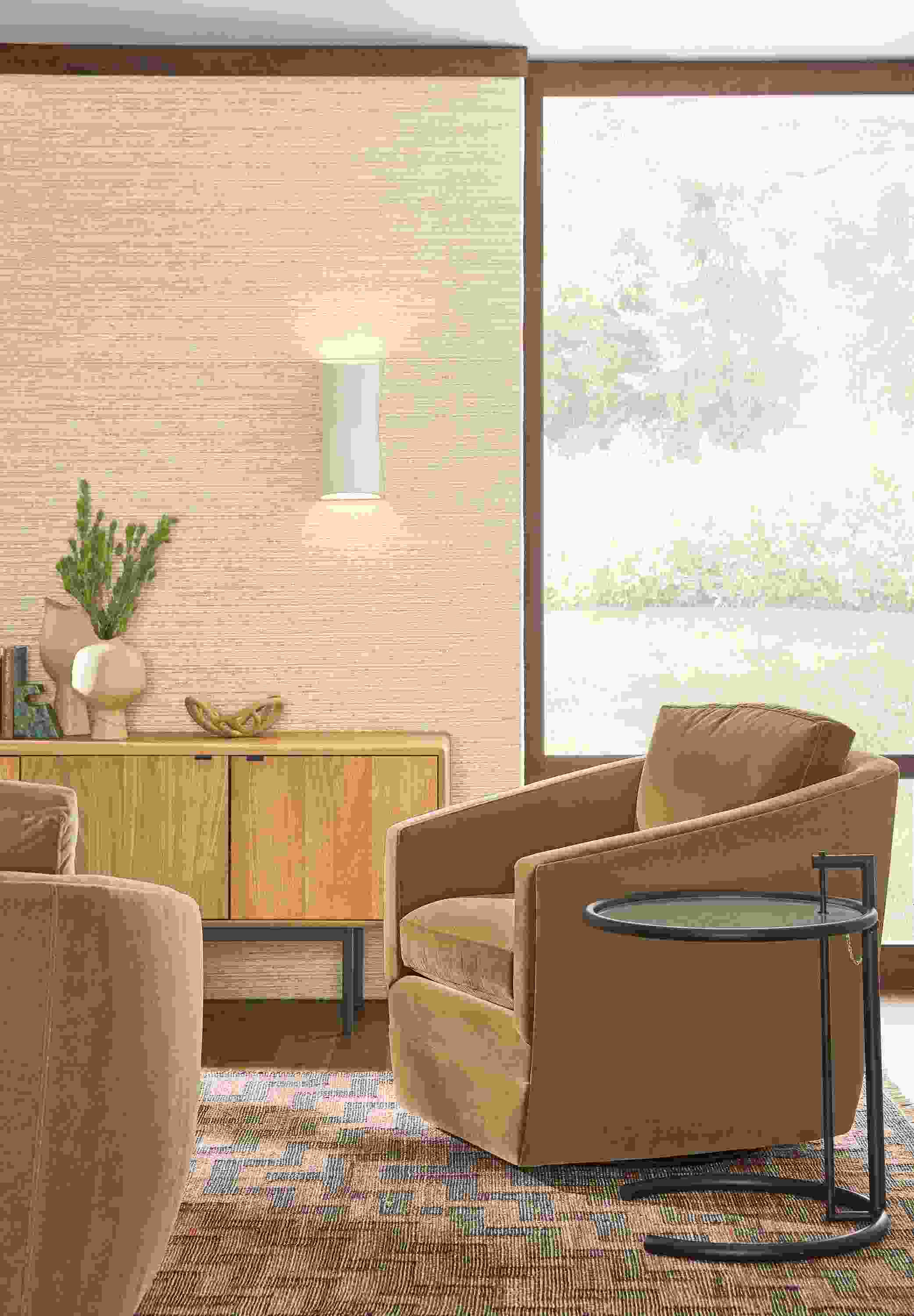 Detail of Ford swivel chair in Banks Camel velvet in living room.