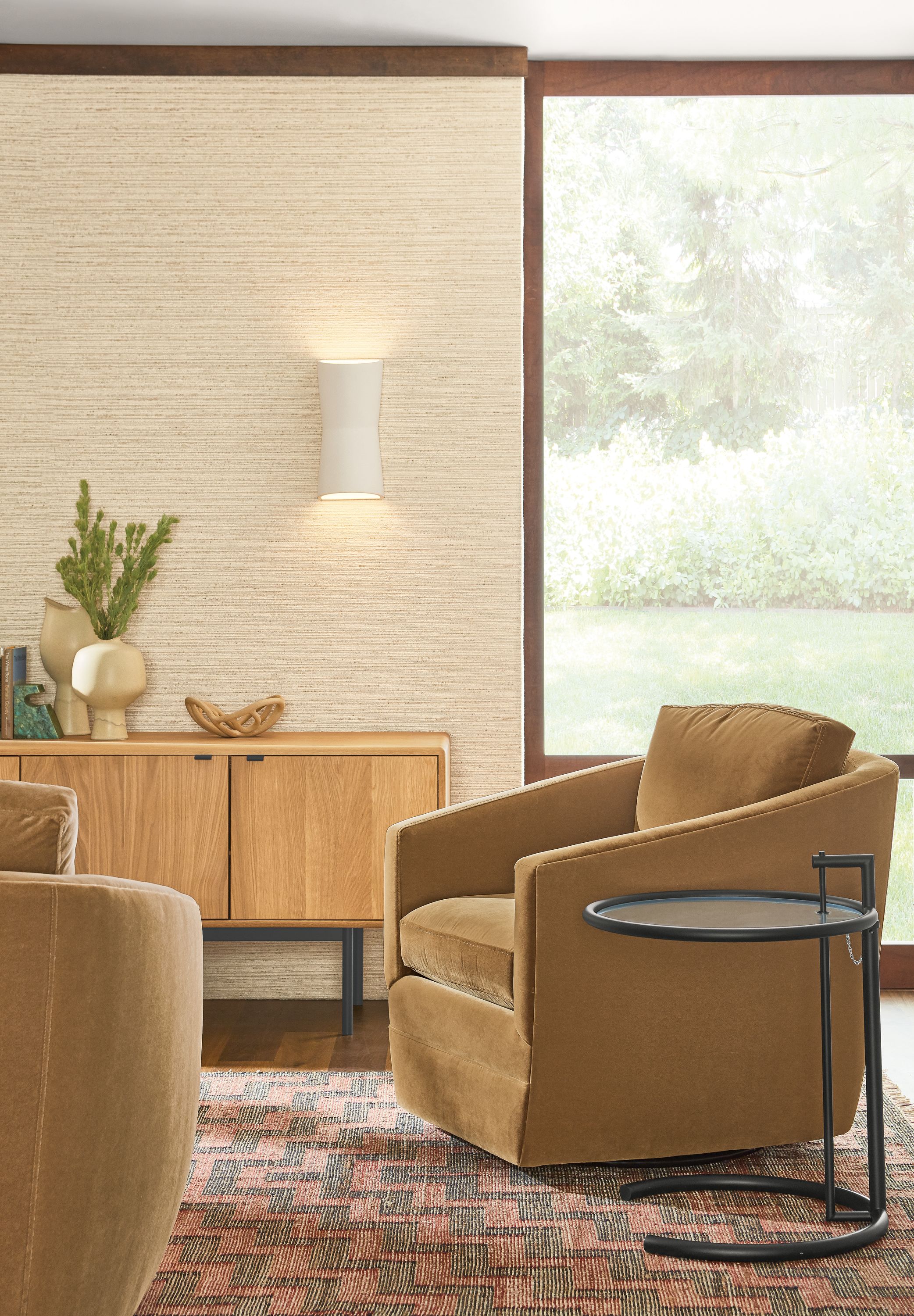 Detail of Ford swivel chair in Banks Camel velvet in living room.