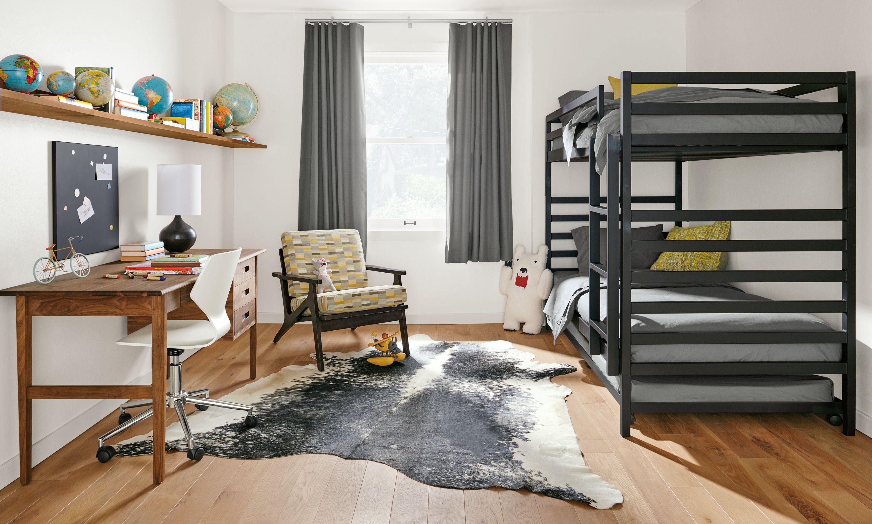 Trundle bed in natural steel; shown with trundle mattress, sold separately