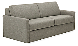Angled view of Franklin 81-inch foldout sleeper sofa in Tepic Grey fabric.