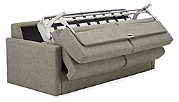 Detail of Franklin foldout sleeper sofa in partially open position in Tepic Grey fabric.