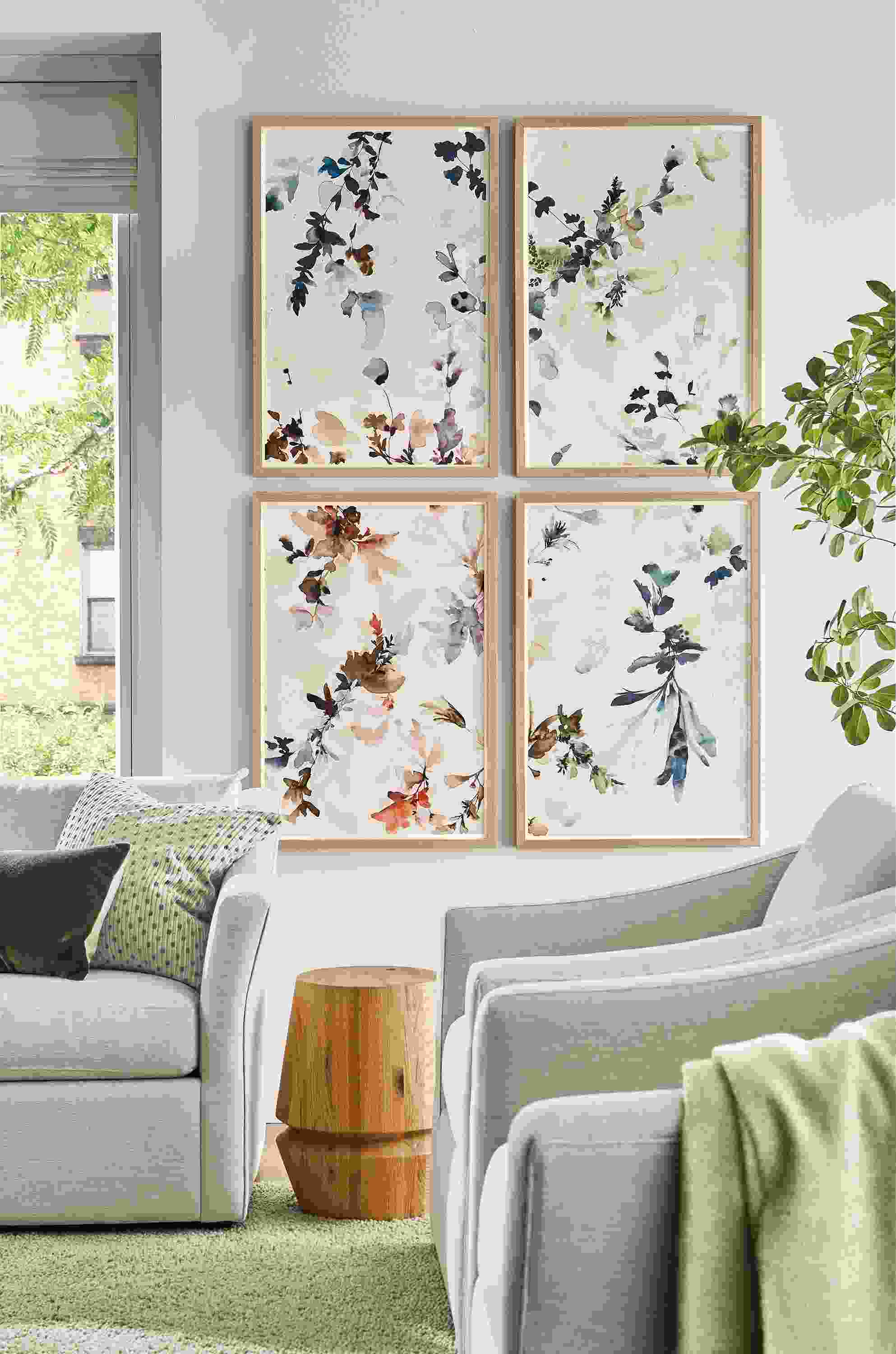 Living room with Jen Garrido art pieces, Wild Flowers Study #1, 2, 3 and 4.