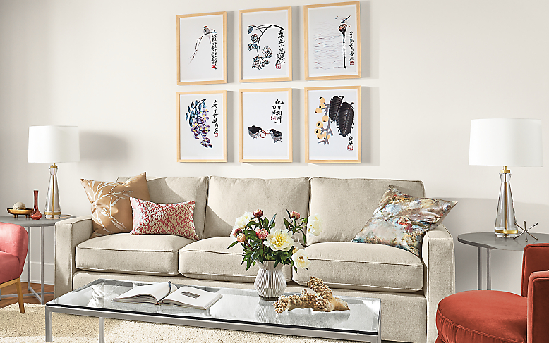 Detail of York sofa with Sadie chairs, Otis swivel chair and Qi Baishi wall art.