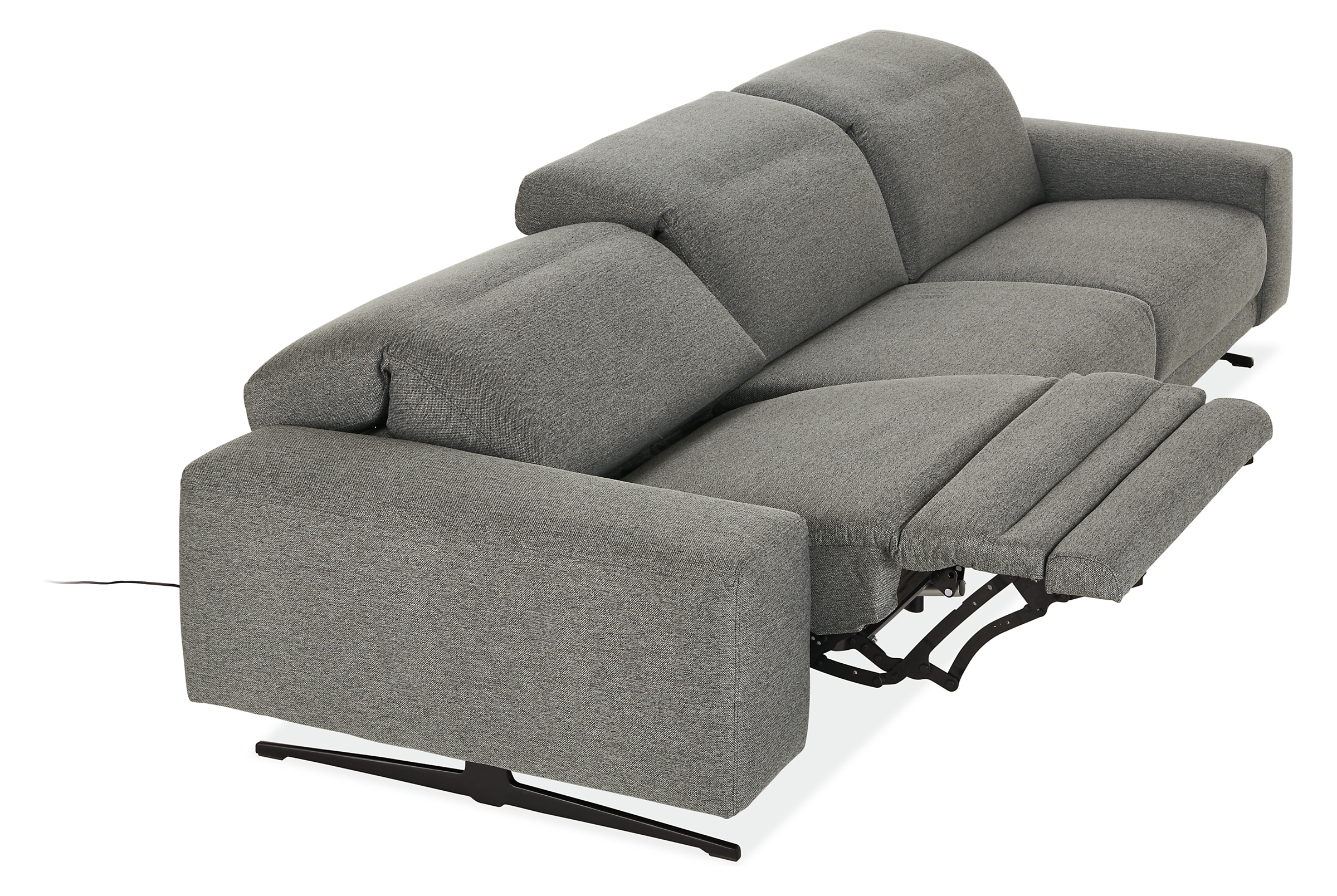 Detail of Gio 3 piece sofa with power in fabric shown in full recline position with headrest lowered position.