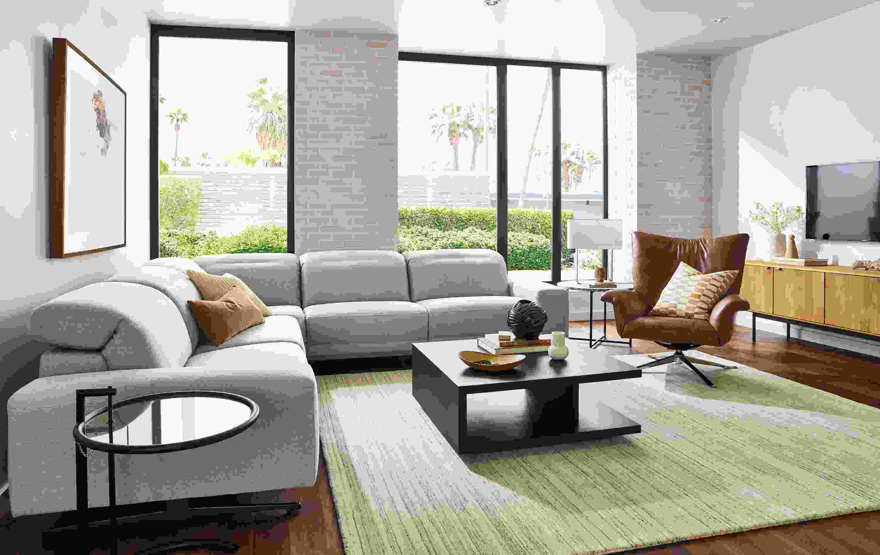 room setting with 5-piece gio power-reclining sectional, with all headrests and footrests collapsed