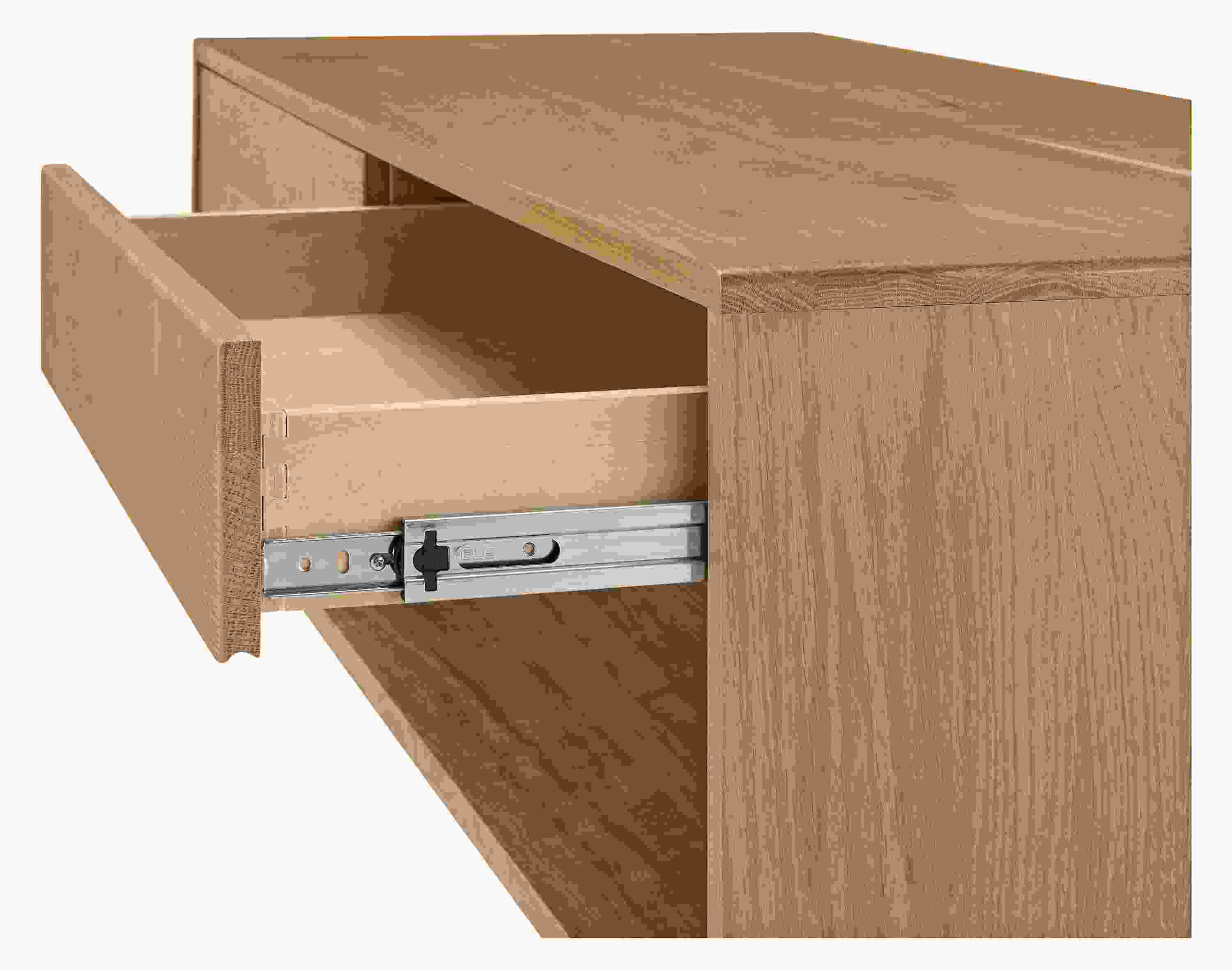 Graft 60-wide by 24 by 15-high coffee table in reclaimed white oak with open drawer showing drawer slide.