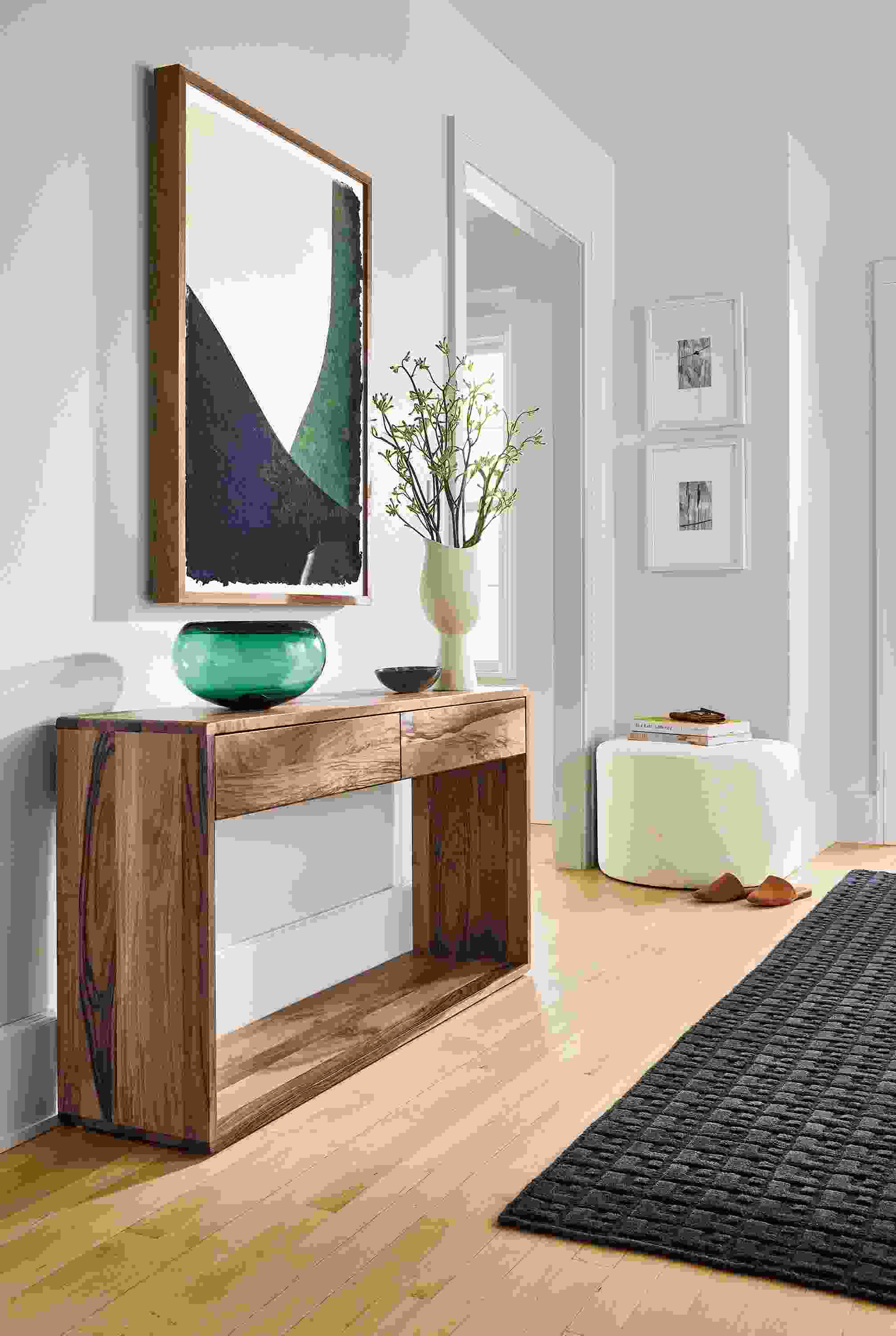 Entryway with Graft console table in walnut, John Robshaw dip dye, Silva ottoman.