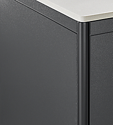 corner detail of Granger 28-wide Outdoor Cabinet with Metal Door Fridge and Stone Top.
