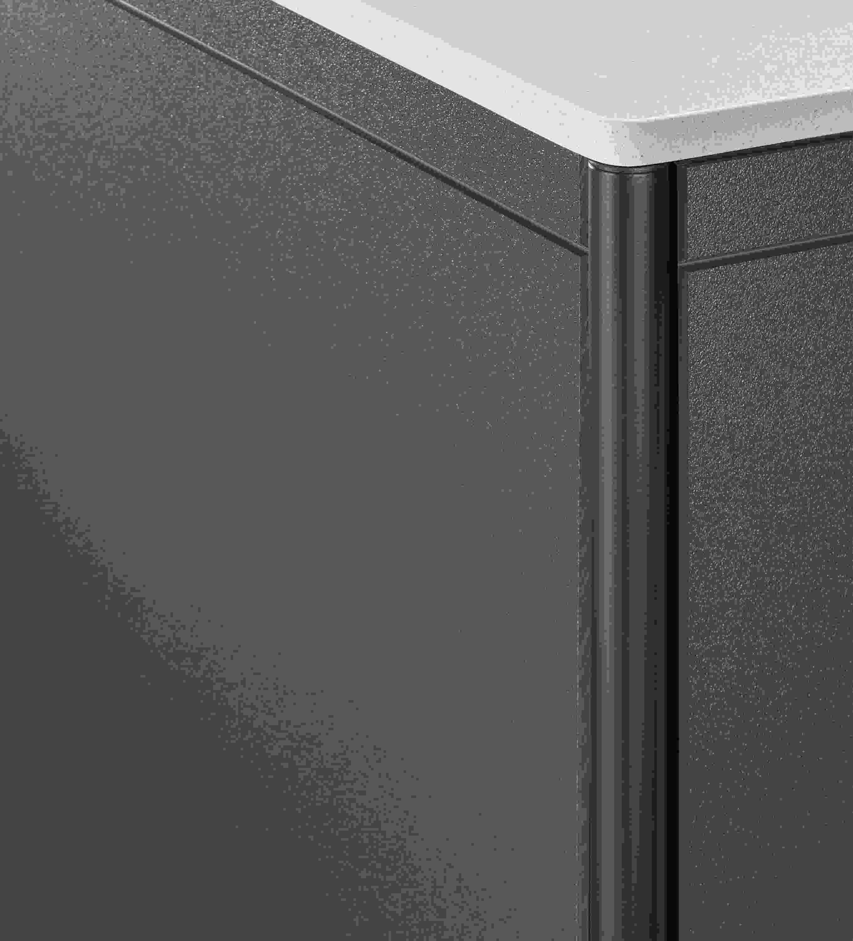 corner detail of Granger 28-wide Outdoor Cabinet with Metal Door Fridge and Stone Top.