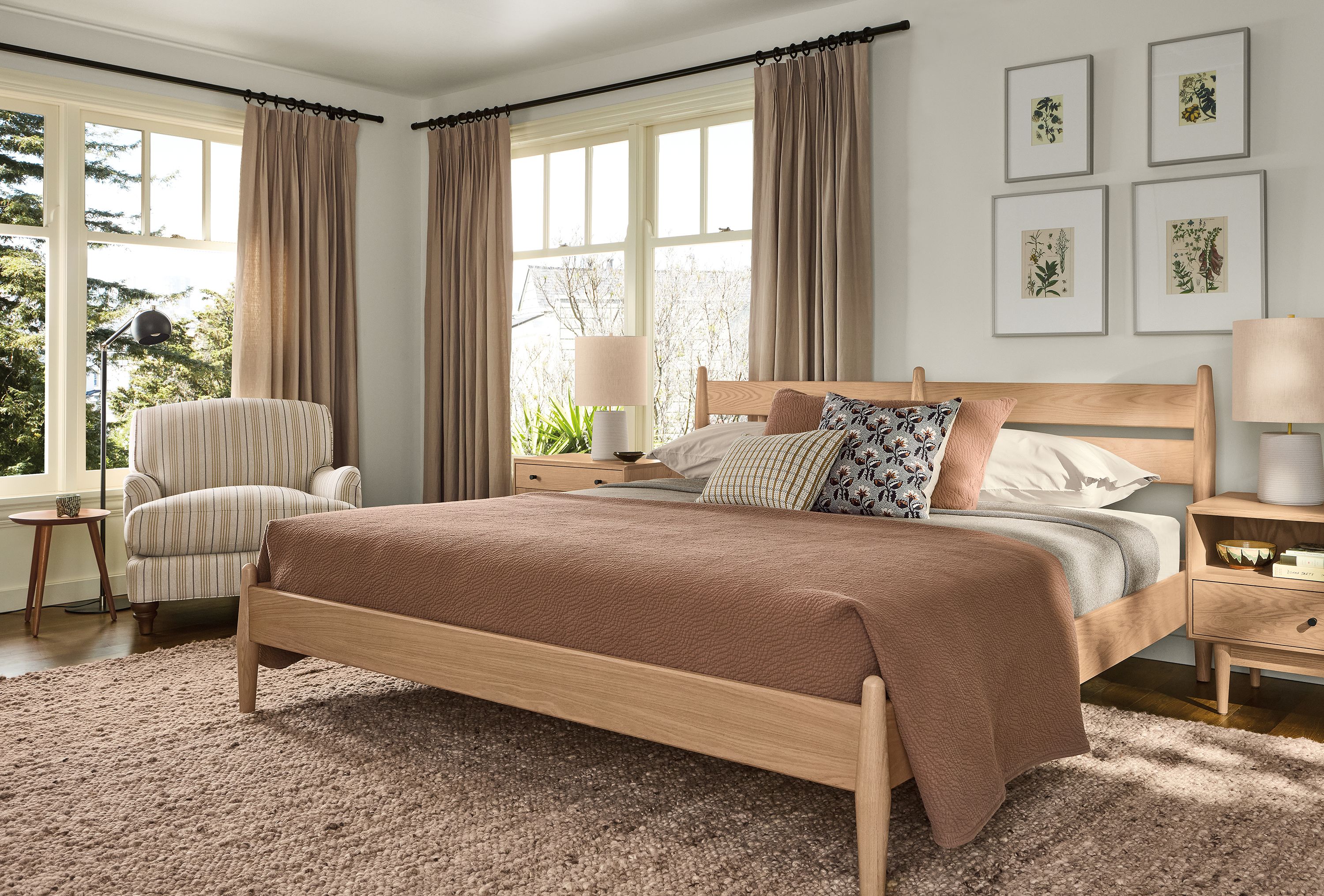 Bedroom with  Grove king bed and nightstands in rye on red oak and Cobble 9 by 12 rug in putty.