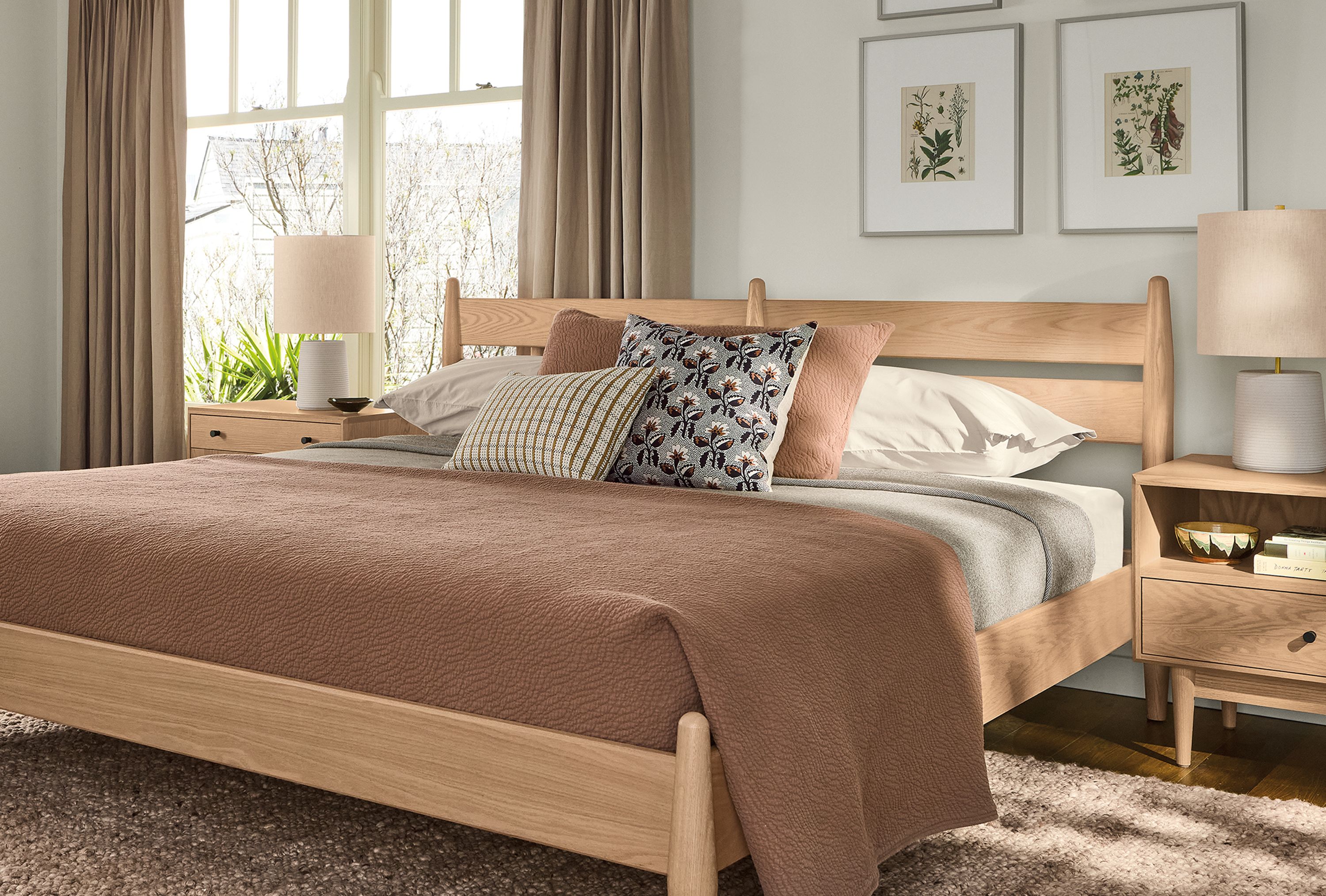 Bedroom with  Grove king bed and nightstands in rye on red oak and Cobble 9 by 12 rug in putty.