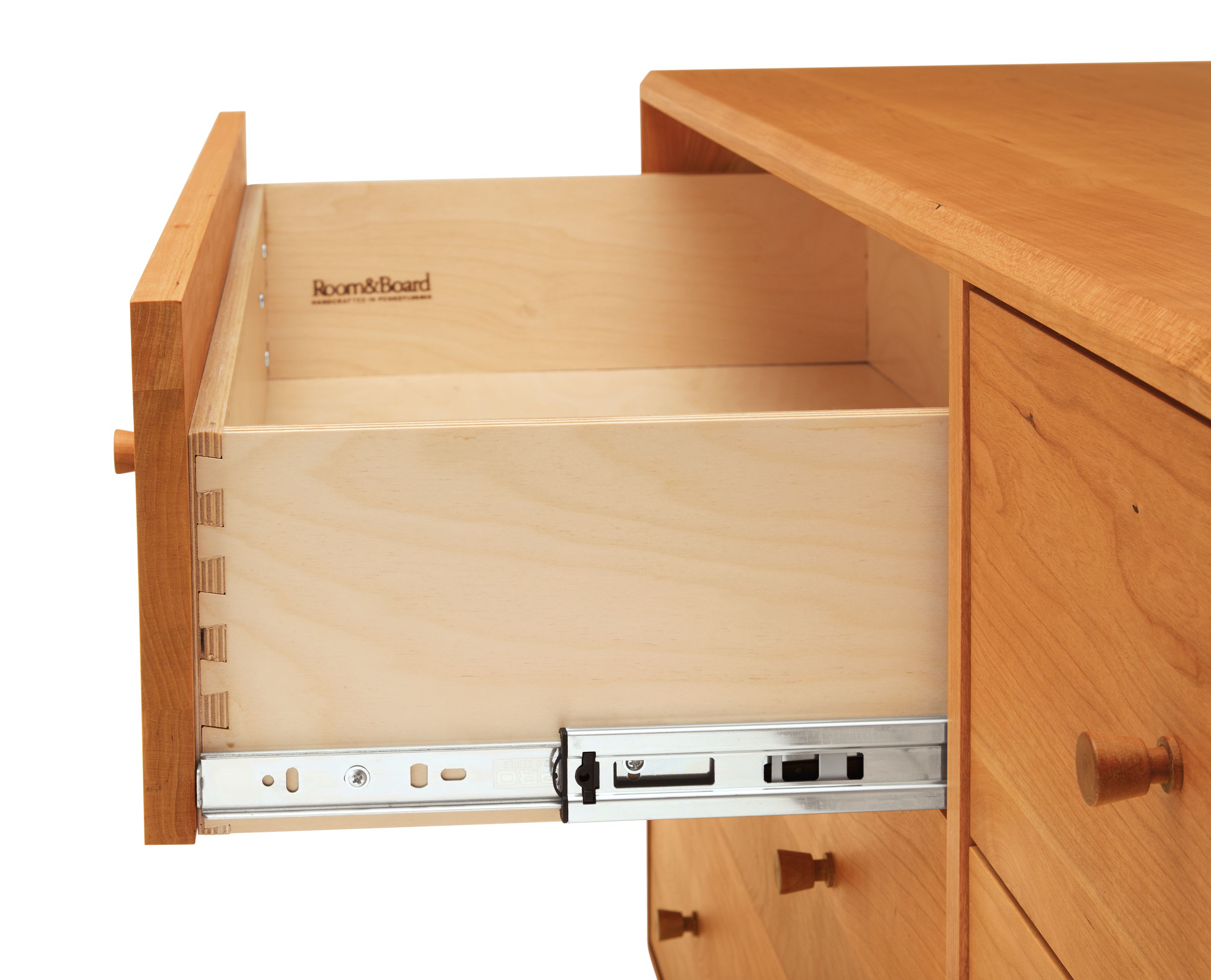 Detail of Grove 72-wide Six-Drawer Dresser in Cherry.