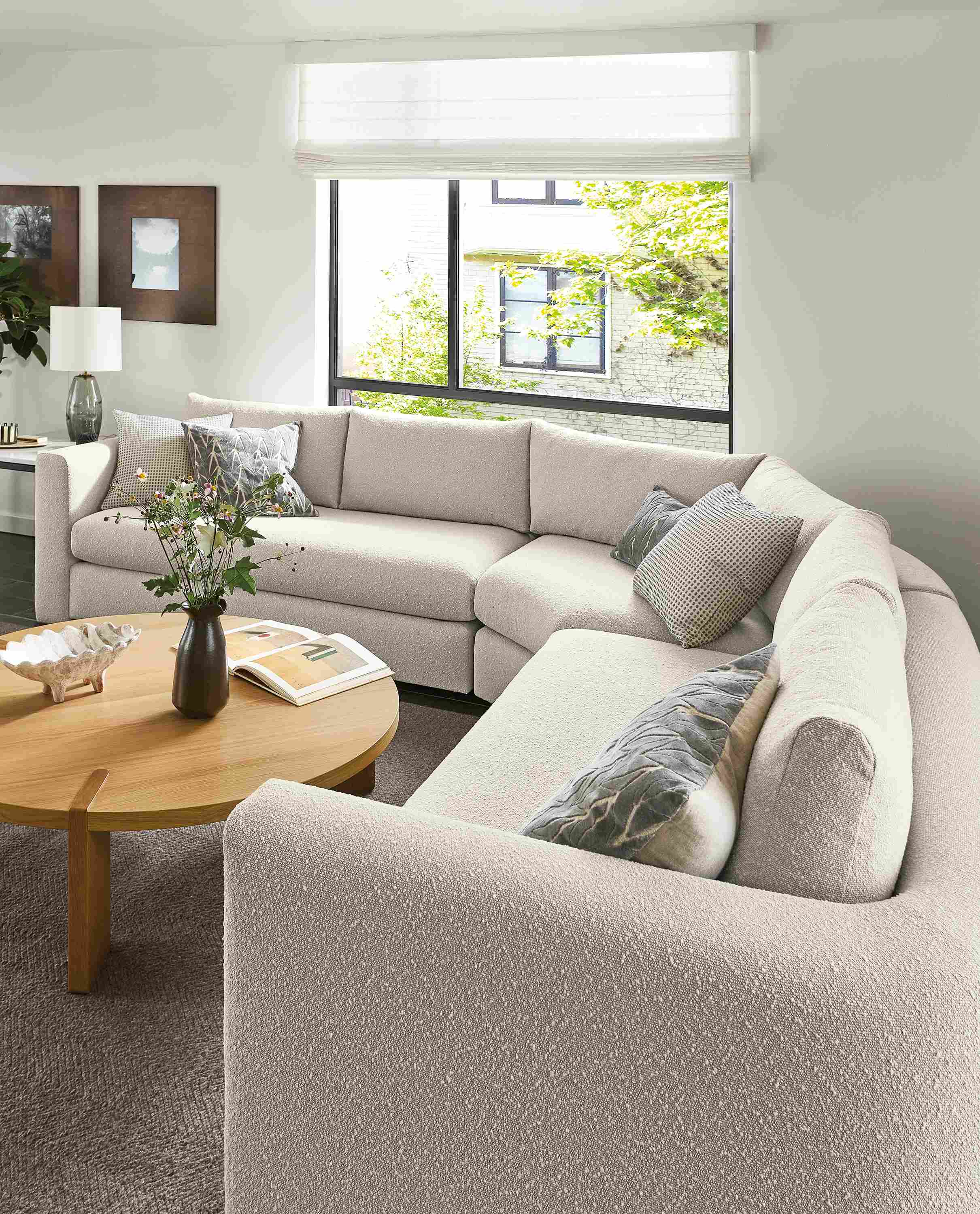 Living room detail of Hannah 124 by 124 3-piece sectional in Declan Natural.