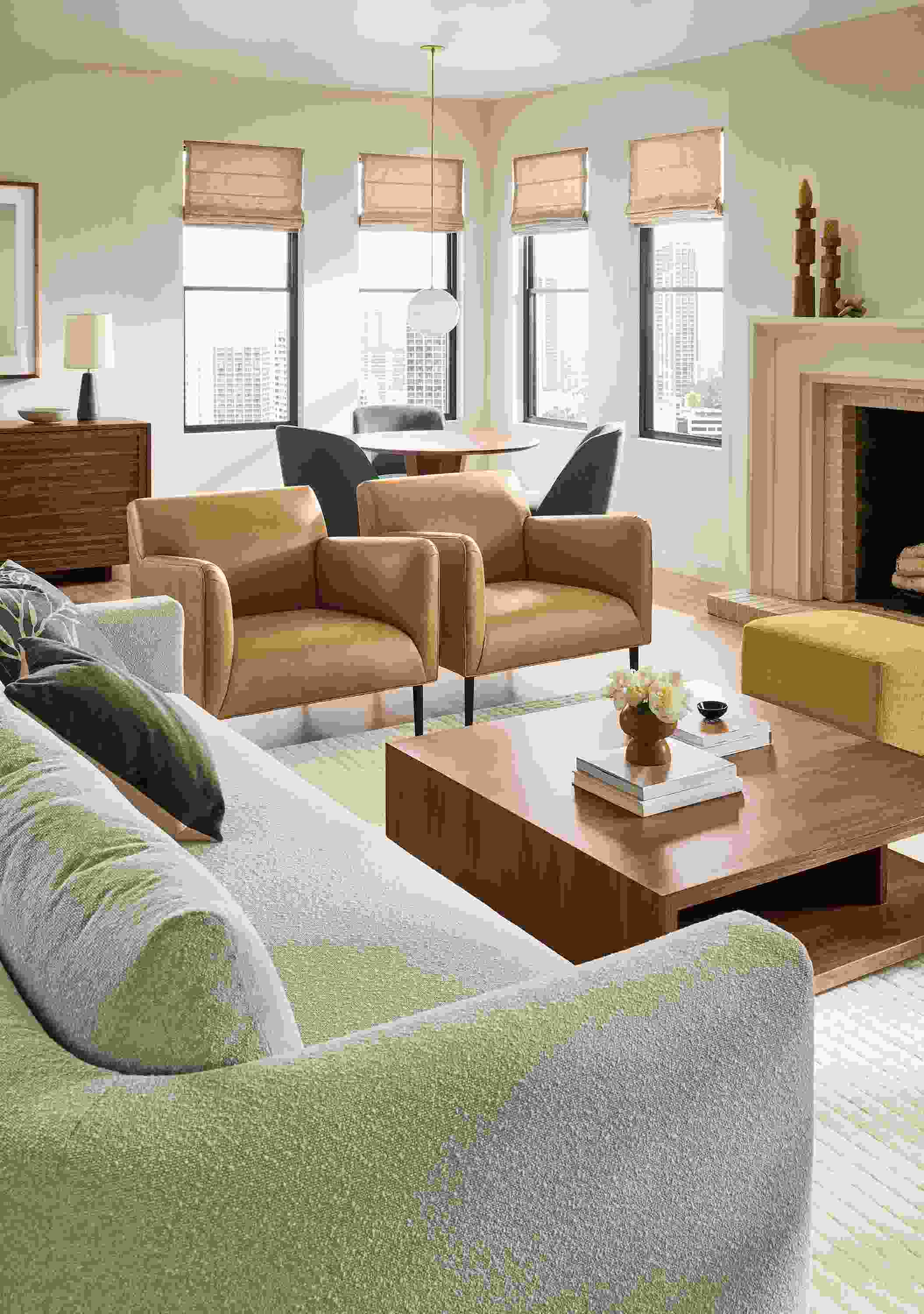 Great room with 2 Matteo chairs in Palermo Camel leather, Graham coffee table in Walnut and Safira rug in Ivory.