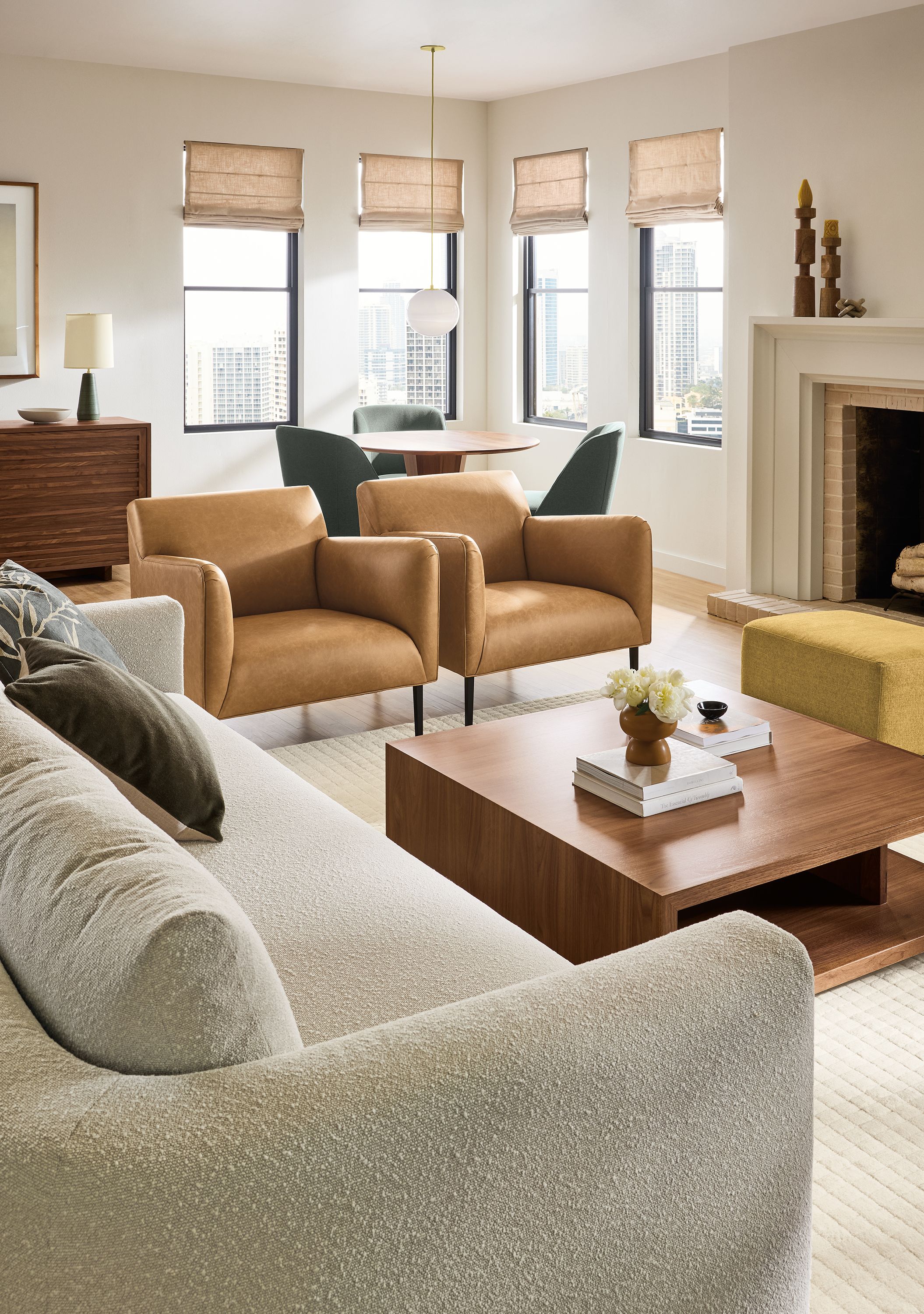 Great room with 2 Matteo chairs in Palermo Camel leather, Graham coffee table in Walnut and Safira rug in Ivory.