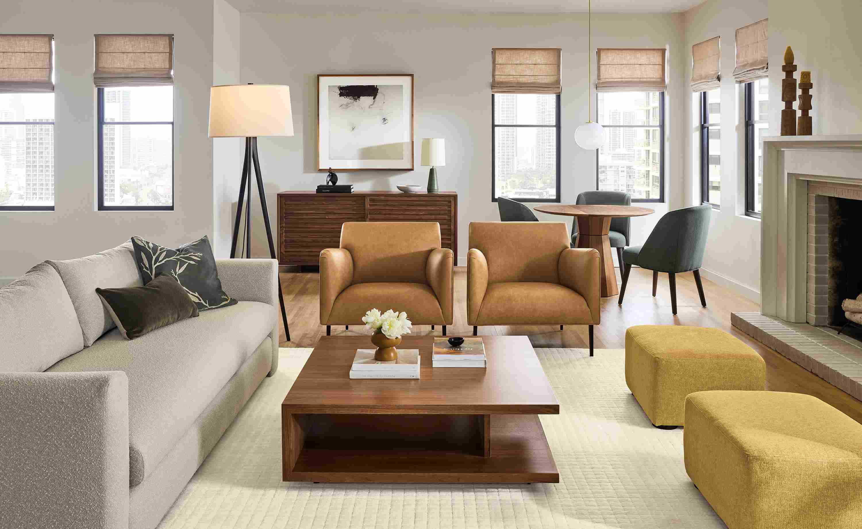 Great room with Hannah 96-wide Bench Cushion Sofa in Declan Natural, 2 Matteo chairs in Palermo Camel leather and Safira rug in Ivory.