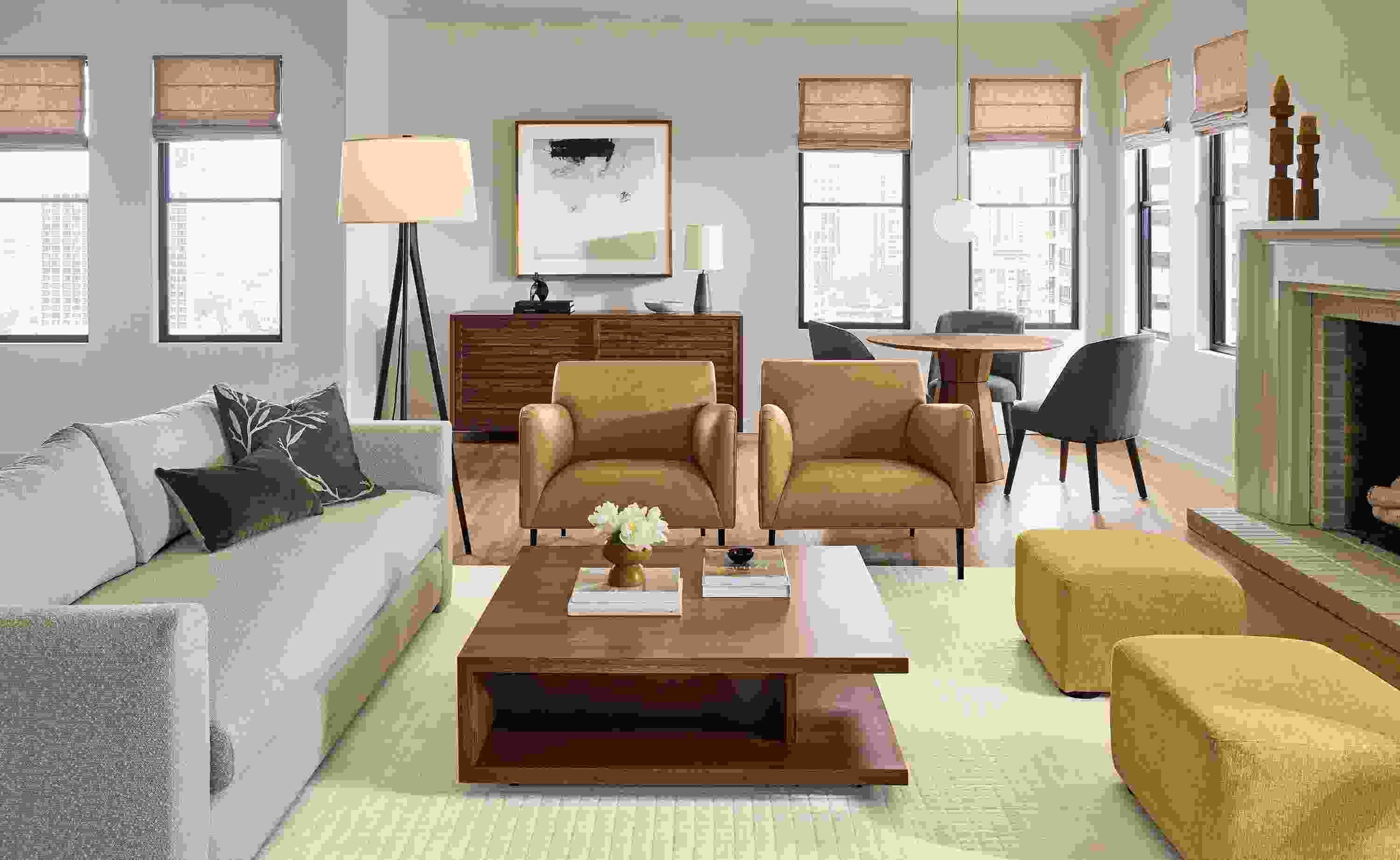 Great room with Hannah 96-wide Bench Cushion Sofa in Declan Natural, 2 Matteo chairs in Palermo Camel leather and Safira rug in Ivory.