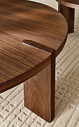 Close detail of Hanover 48-round coffee table in walnut.