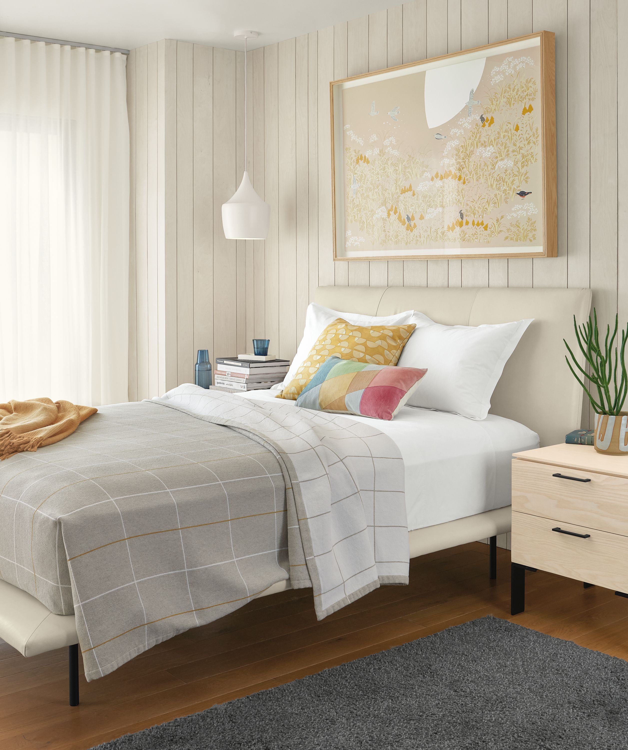 Detail of Hanson queen bed in vento leather in bedroom beneath haruna niiya wall art.