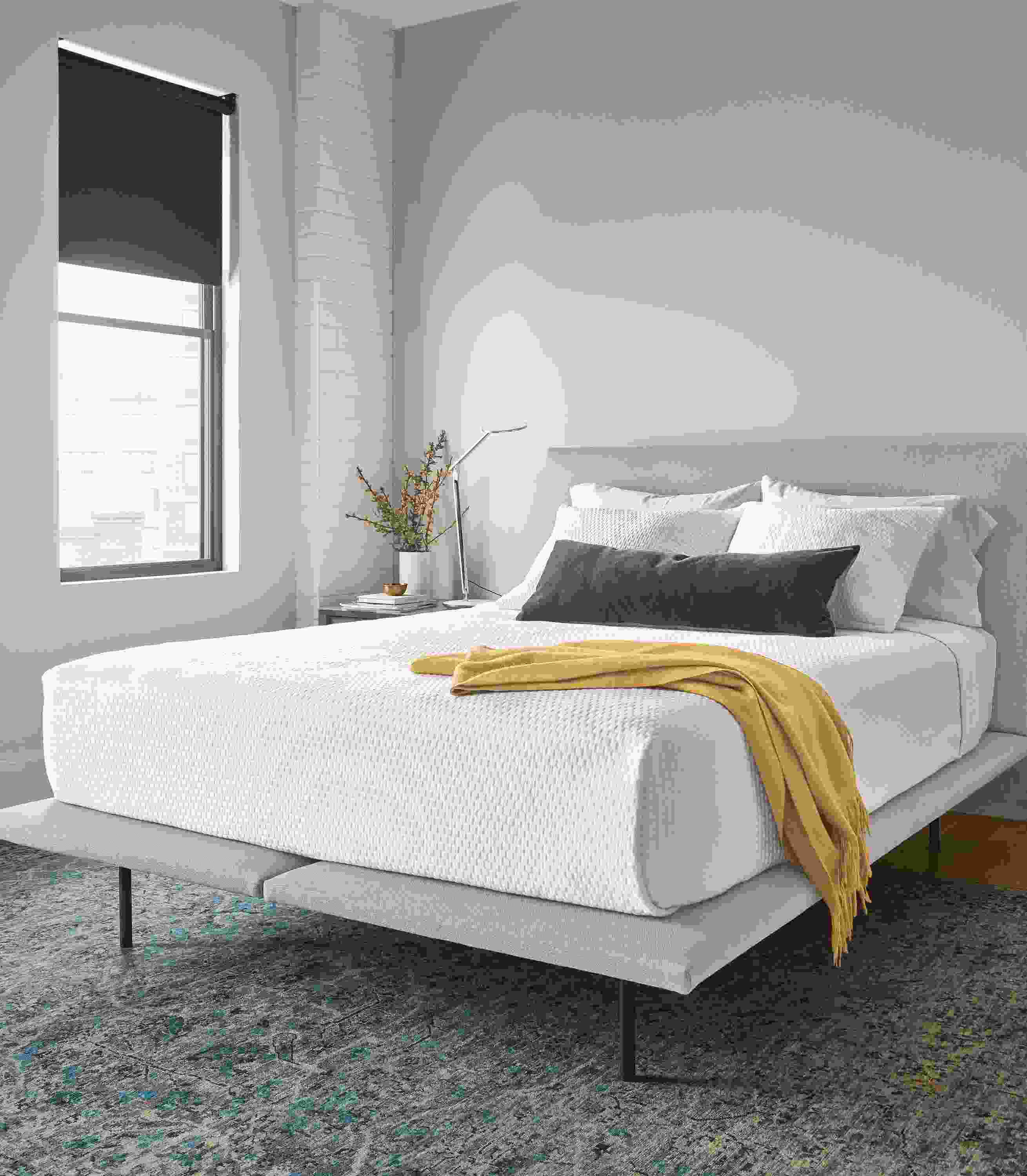 Detail of Hanson bed in modern bedroom.