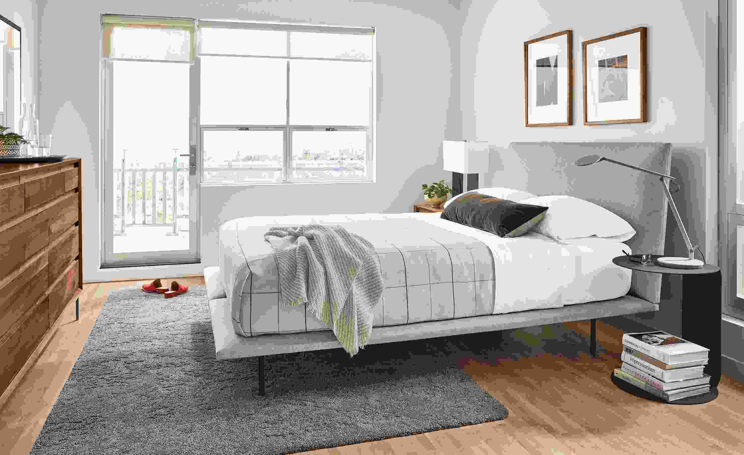 Hanson queen upholstered bed in bedroom.