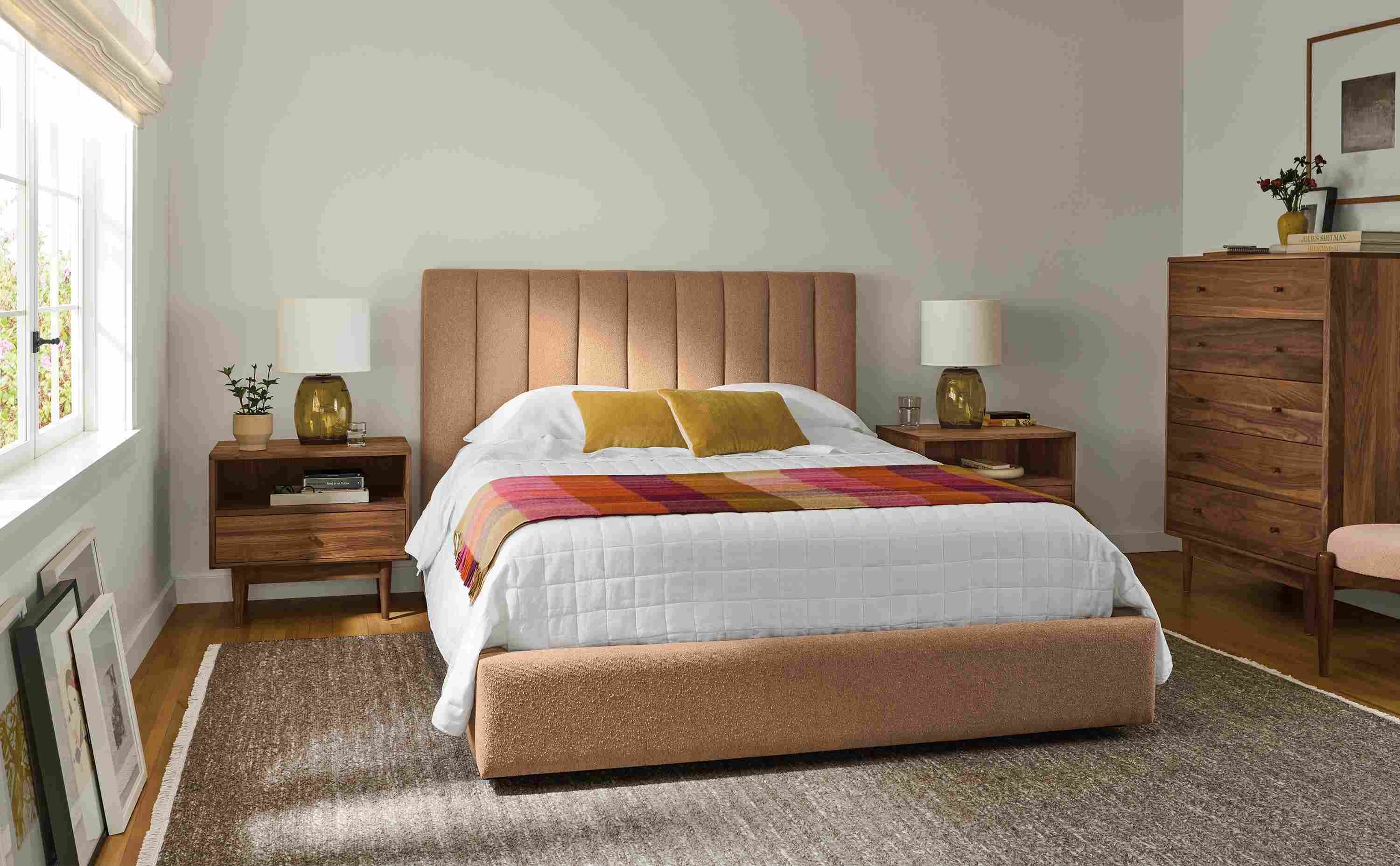 Bedroom with Hartley queen low storage bed in Declan Sienna, 2 Grove nightands and Grove 5-drawer dresser in walnut.