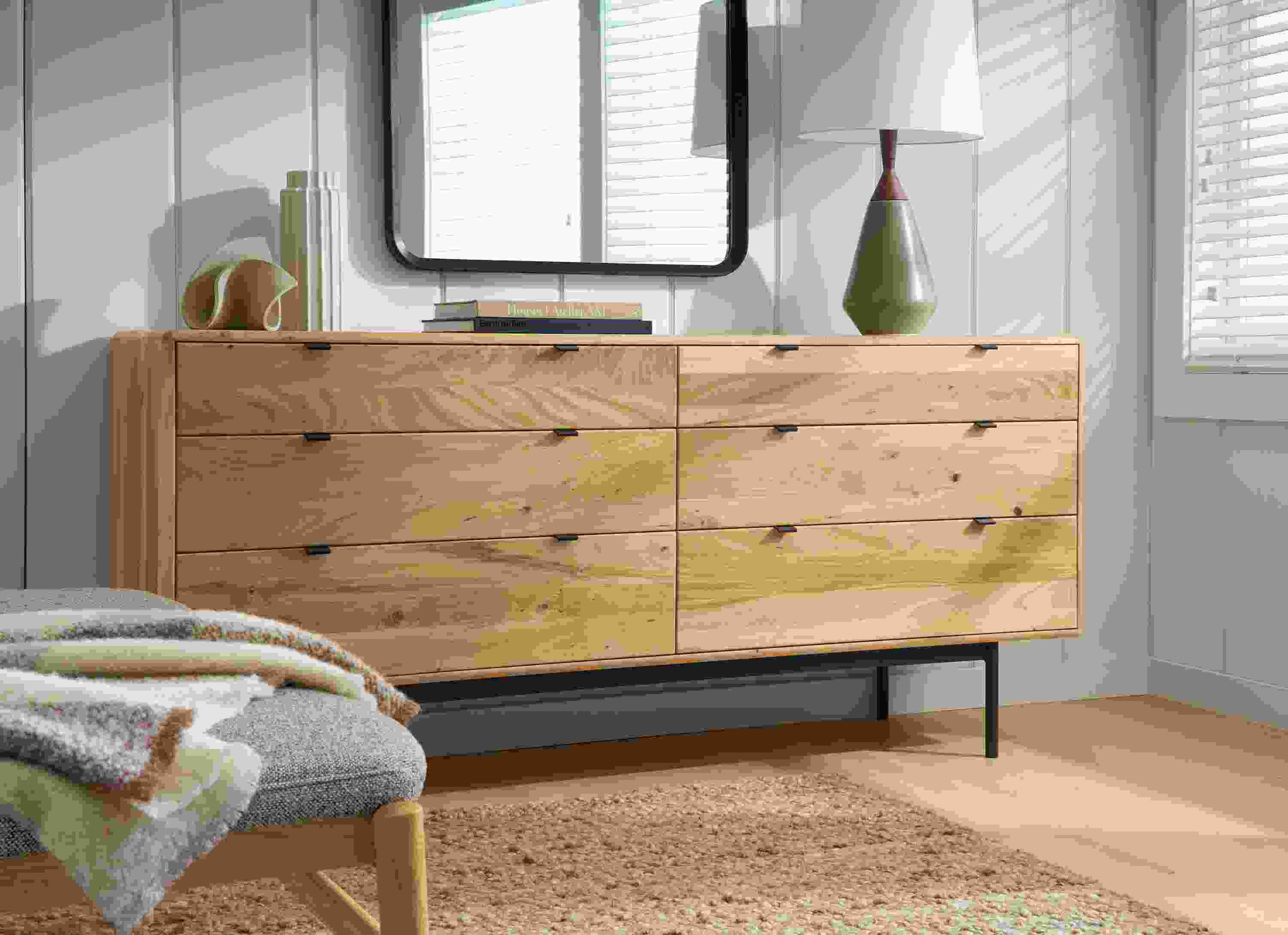 Bedroom with Hensley 72-wide, 6-drawer dresser in reclaimed elm and cobble rug in putty.