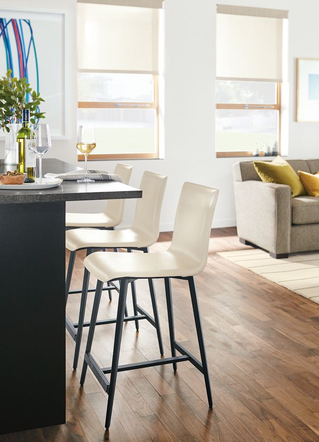 Three Hirsch leather modern kitchen stools.