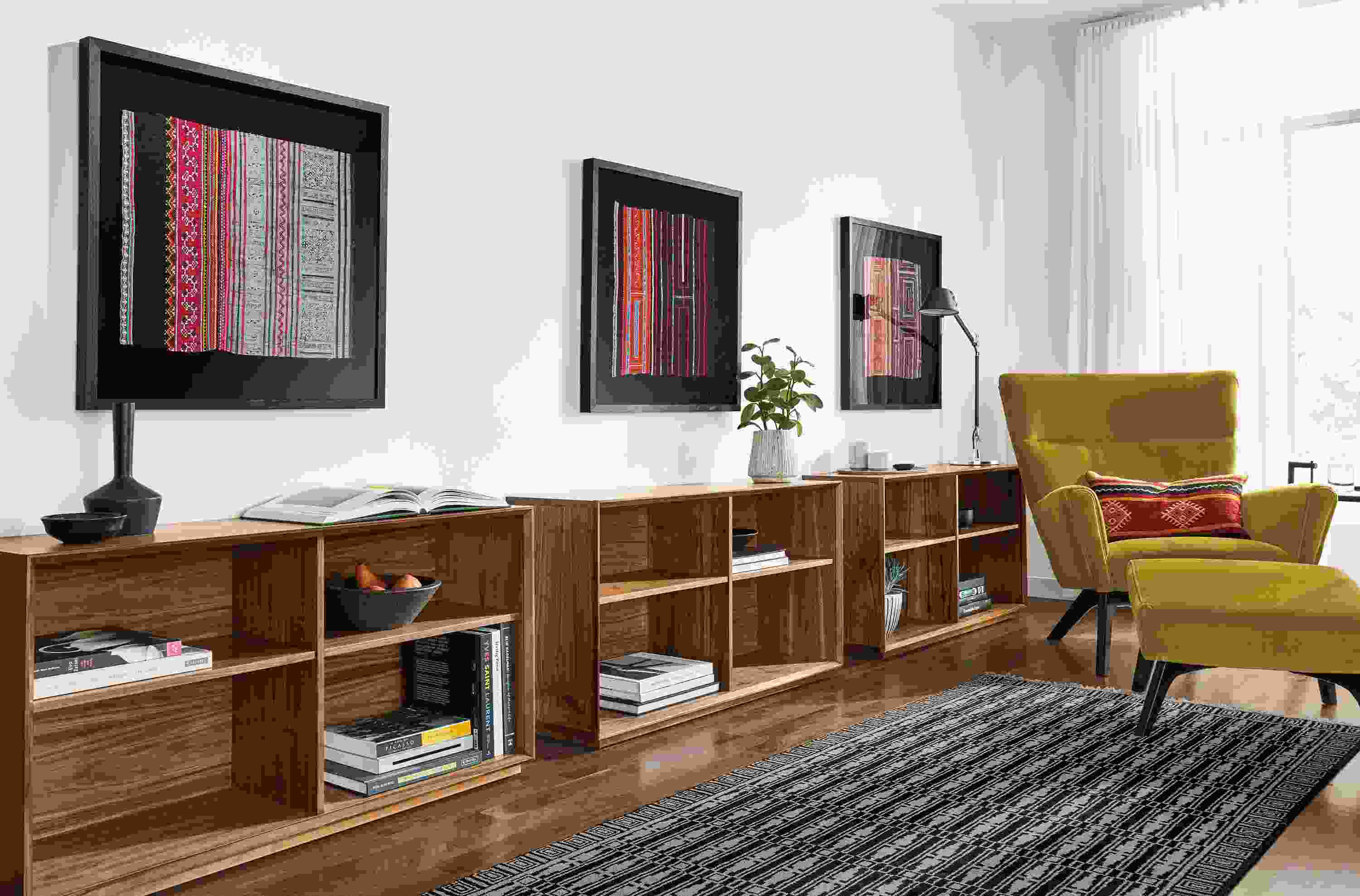 Detail of framed vintage Hmong textiles.