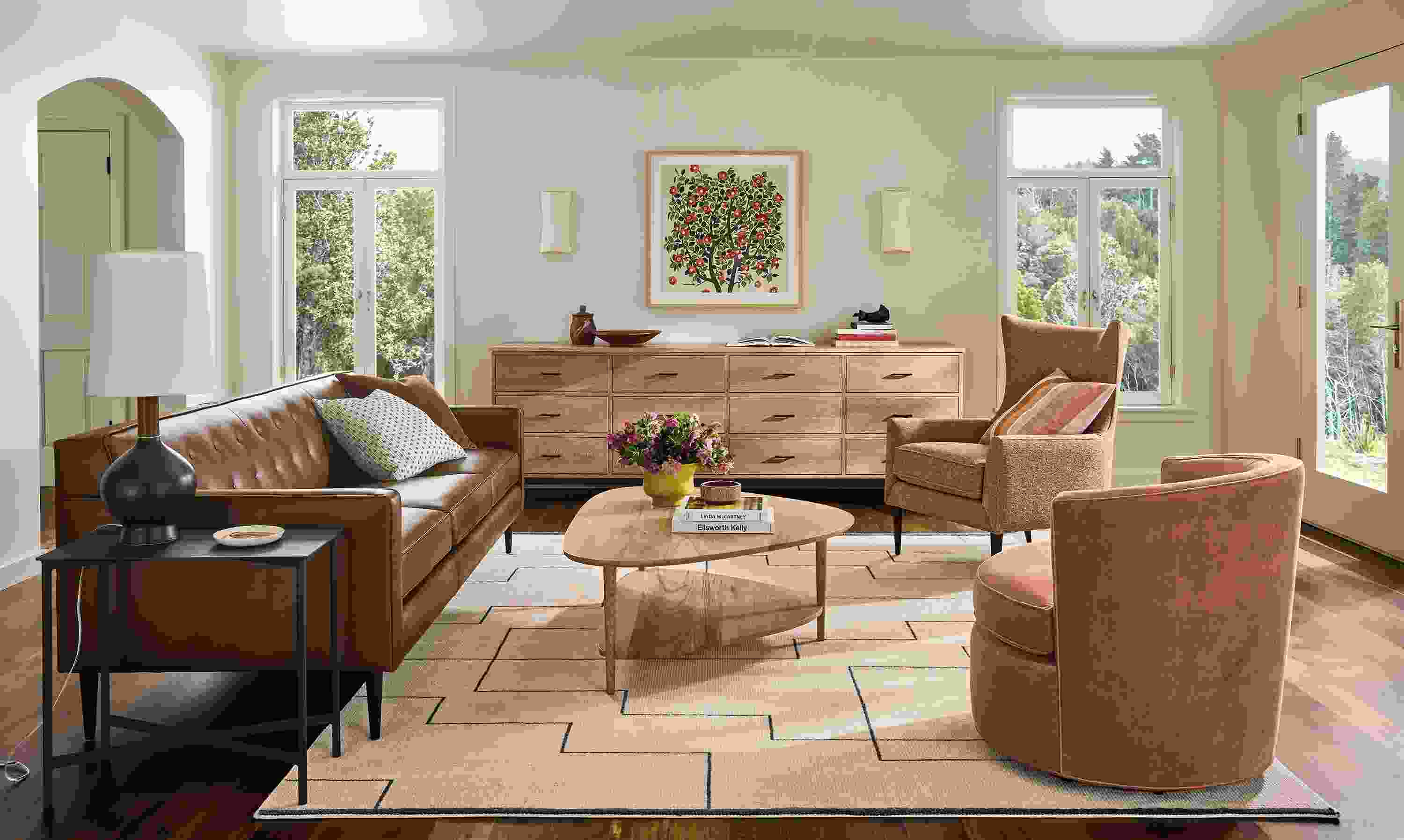 Living room with Holmes 89-wide sofa in Palermo Bourbon, Gibson coffee table in rye on red oak and Navi rug in Ivory/Black.